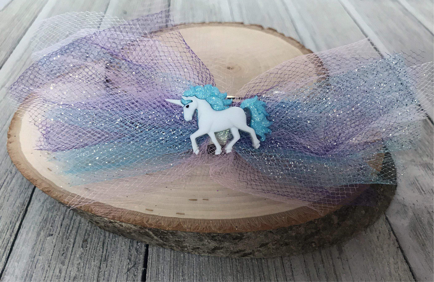 Lazo de pelo de unicornio azul con tul azul y morado