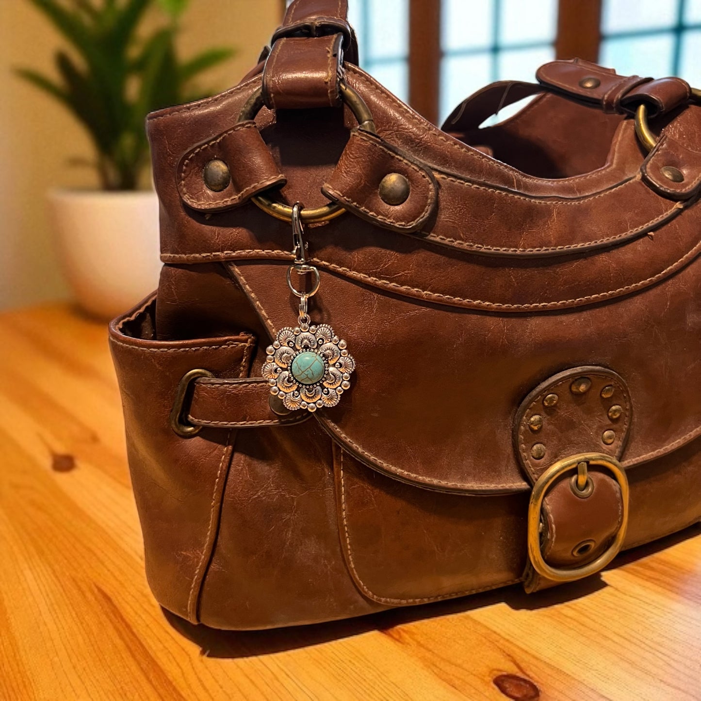 Charm para bolso con tirador de cremallera y color turquesa occidental