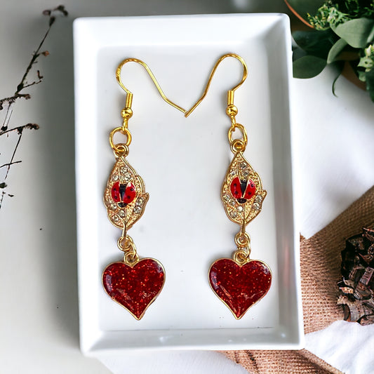 Gold Leaf with Ladybug & Red Heart Dangle Earrings: Whimsical Nature-inspired Jewelry