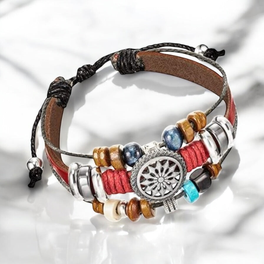 Side view of adjustable red boho bracelet showing layered woven design