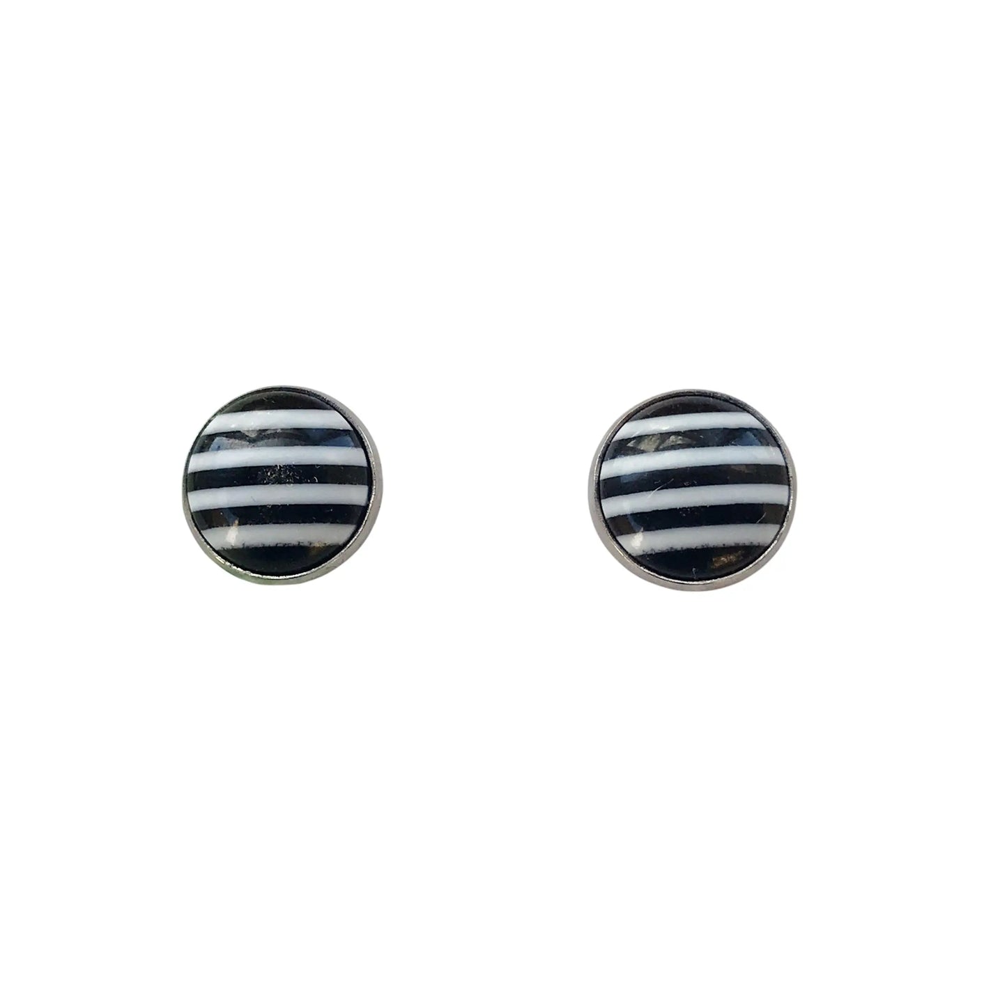 Round black and white striped stud earrings in a silver-tone setting displayed on a white background