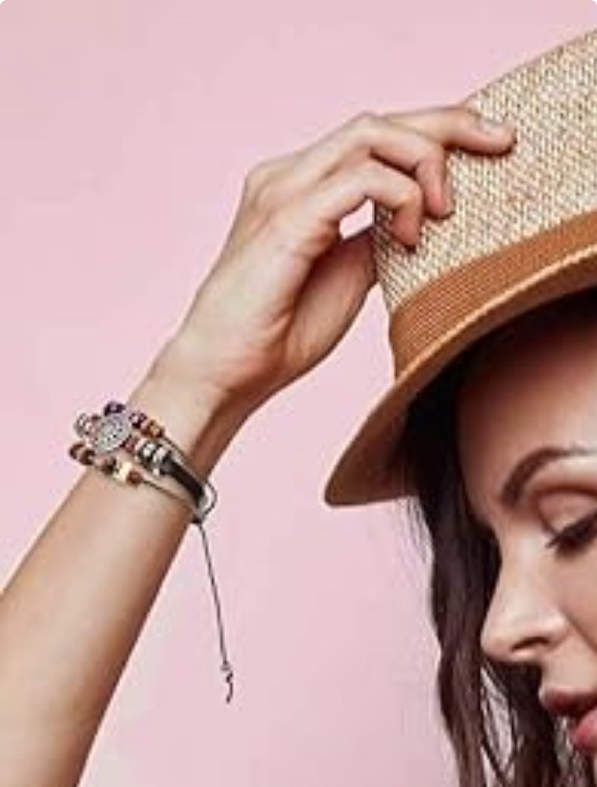 Black wrap bracelet worn on model styled with casual boho outfit