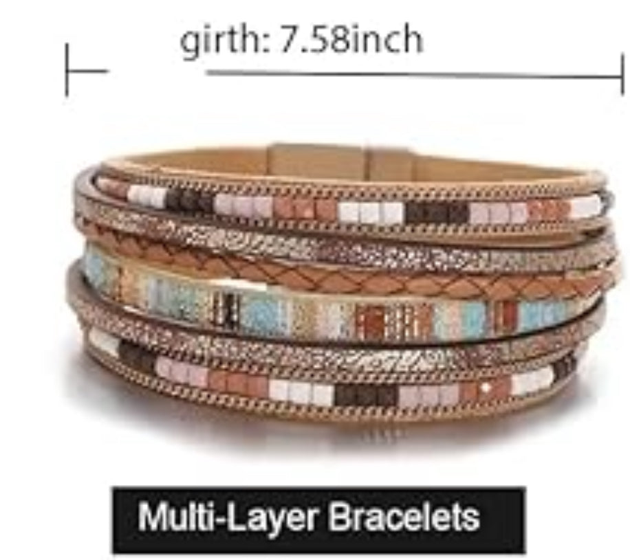 Boho wrap bracelet shown in giftable display with natural props