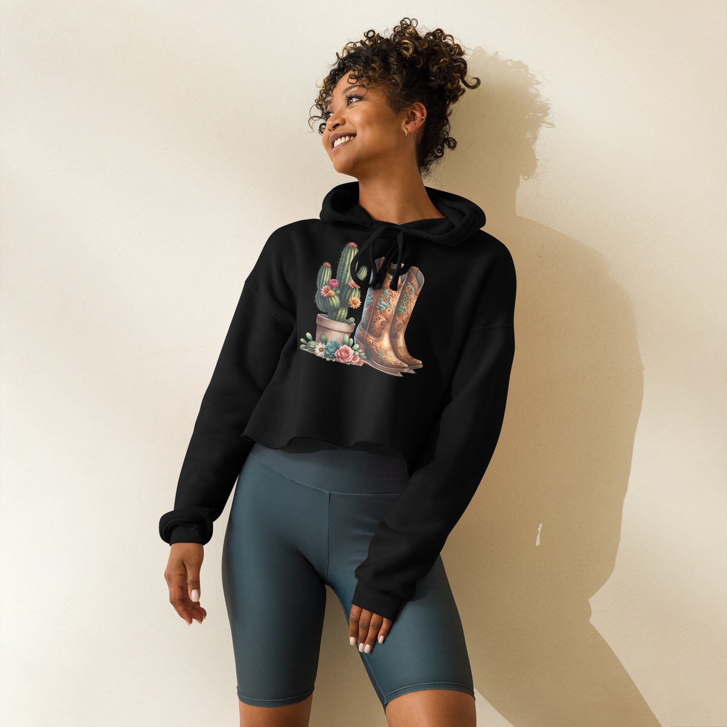 Black crop hoodie with cactus and cowboy boots graphic – front view