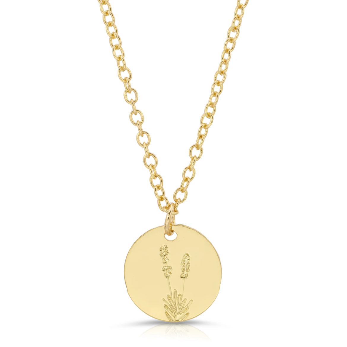 Close-up of dainty lavender flower pendant etched on round gold charm