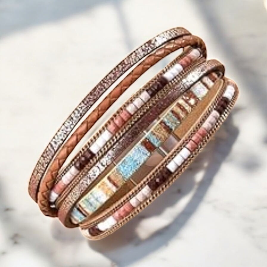 Side view of layered faux leather and bead bracelet on display card