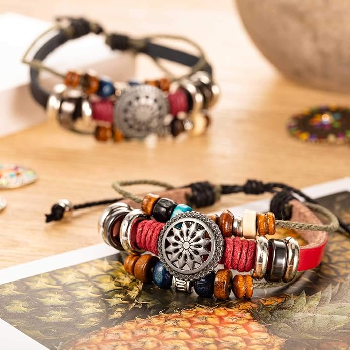Red boho wrap bracelet presented in gift-ready display with earthy tones