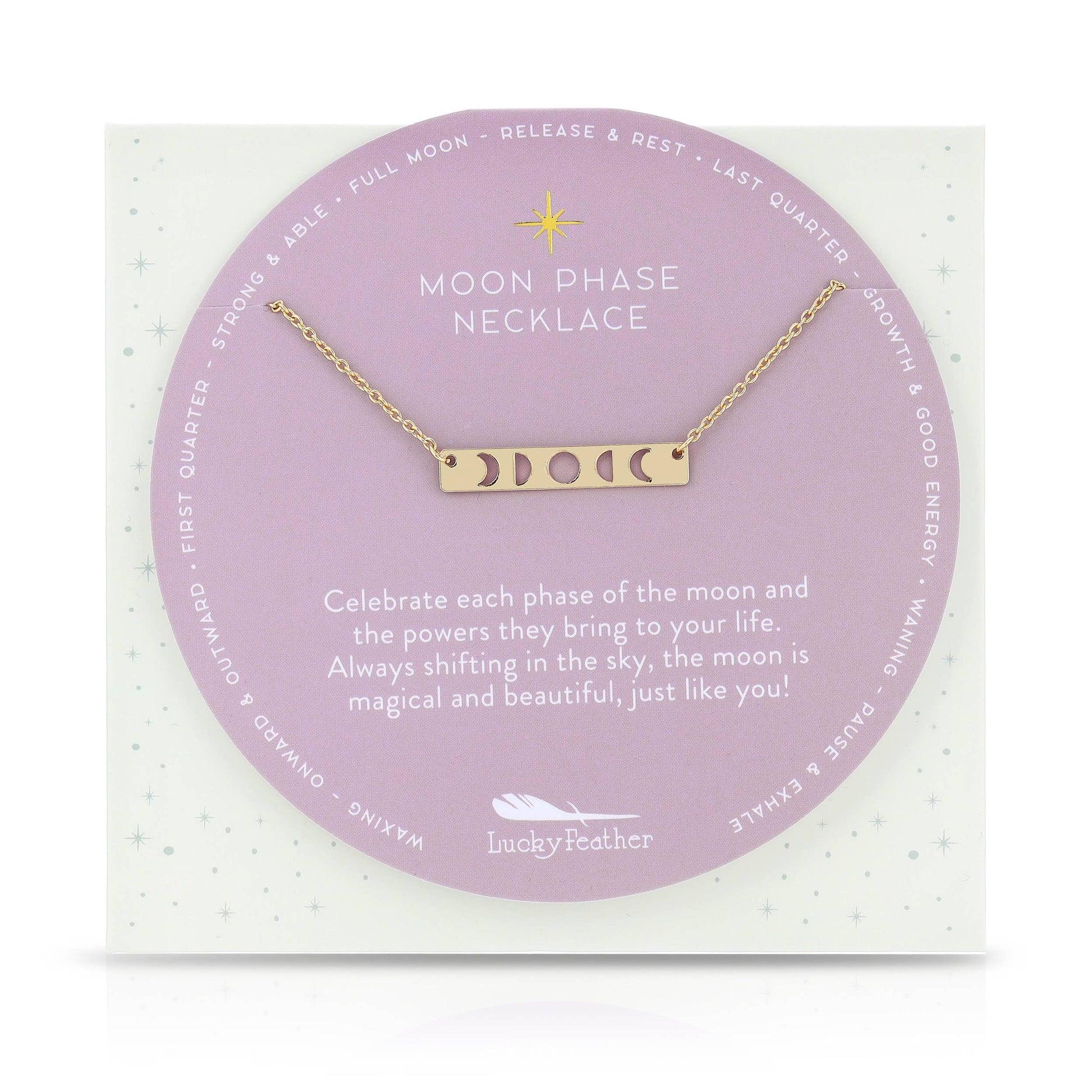 Gold moon phase necklace shown on model with simple everyday outfit