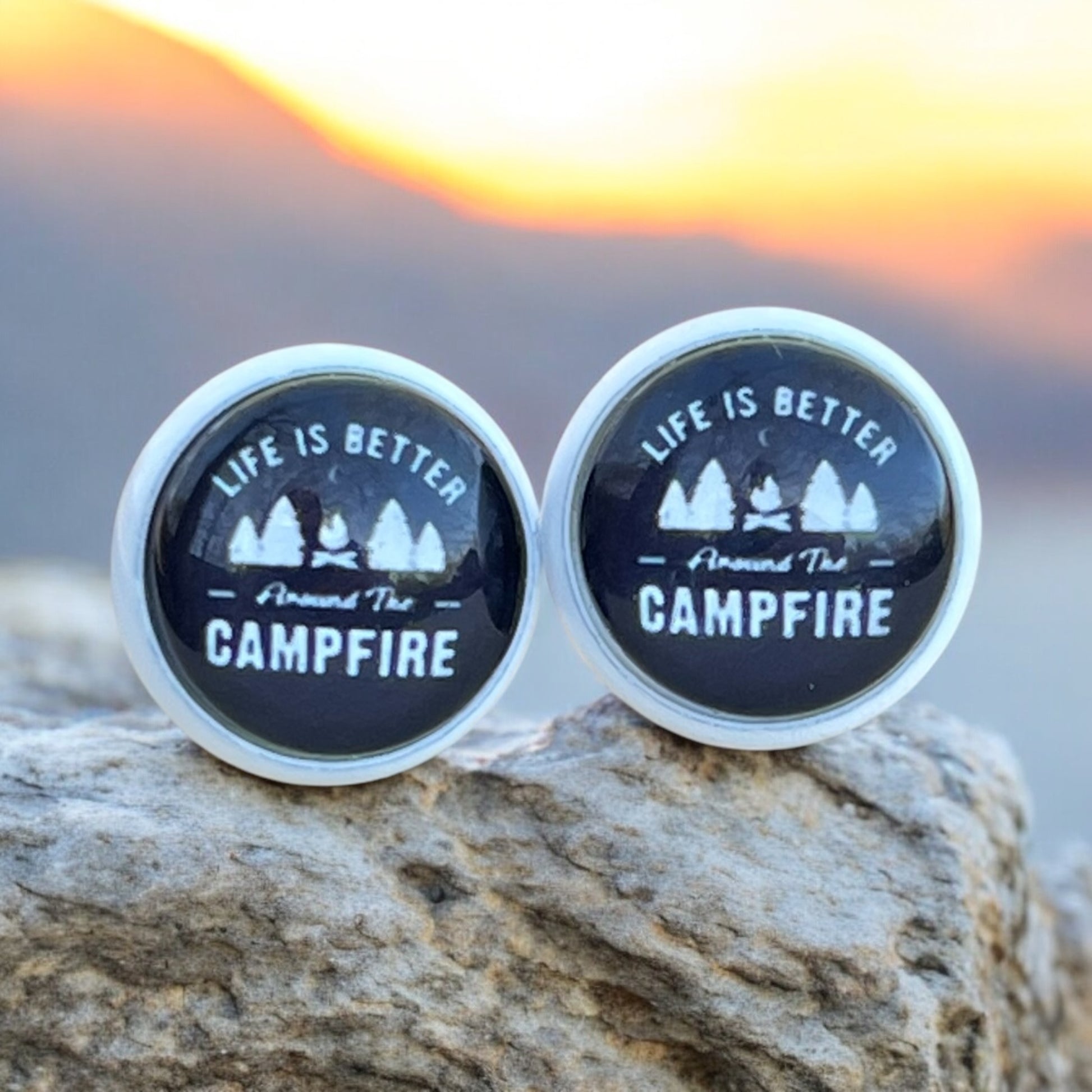 Nature-inspired stud earrings styled with camping gear