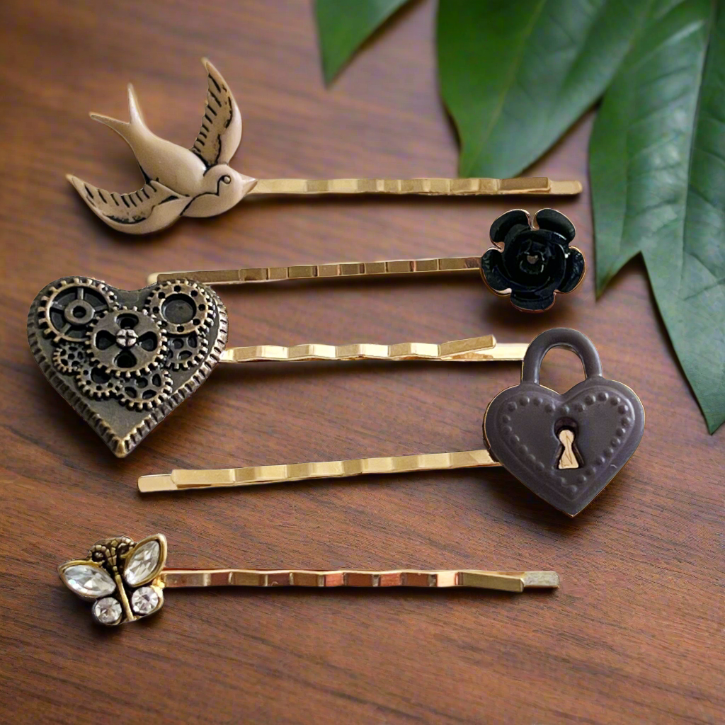 All five steampunk pins displayed together flatlay