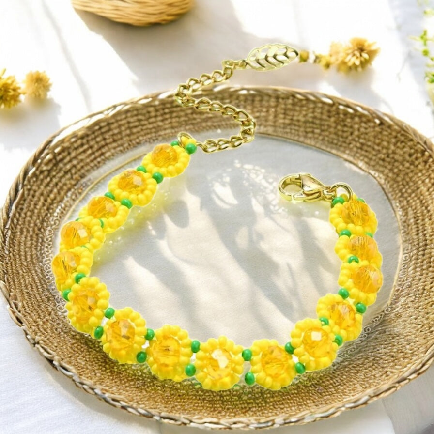Curated sunflower bracelet packaged as a gift with natural props