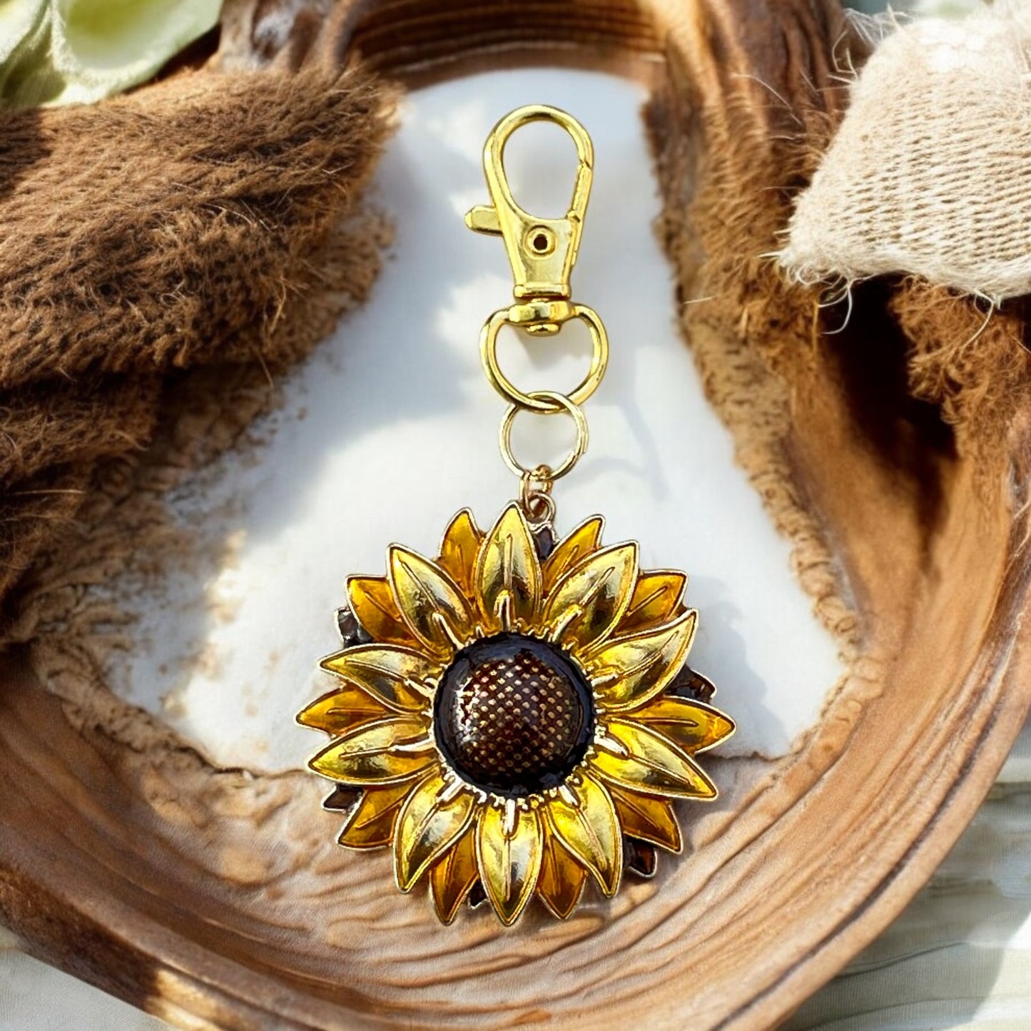 Sunflower purse accessory close-up in sunlight on stone background