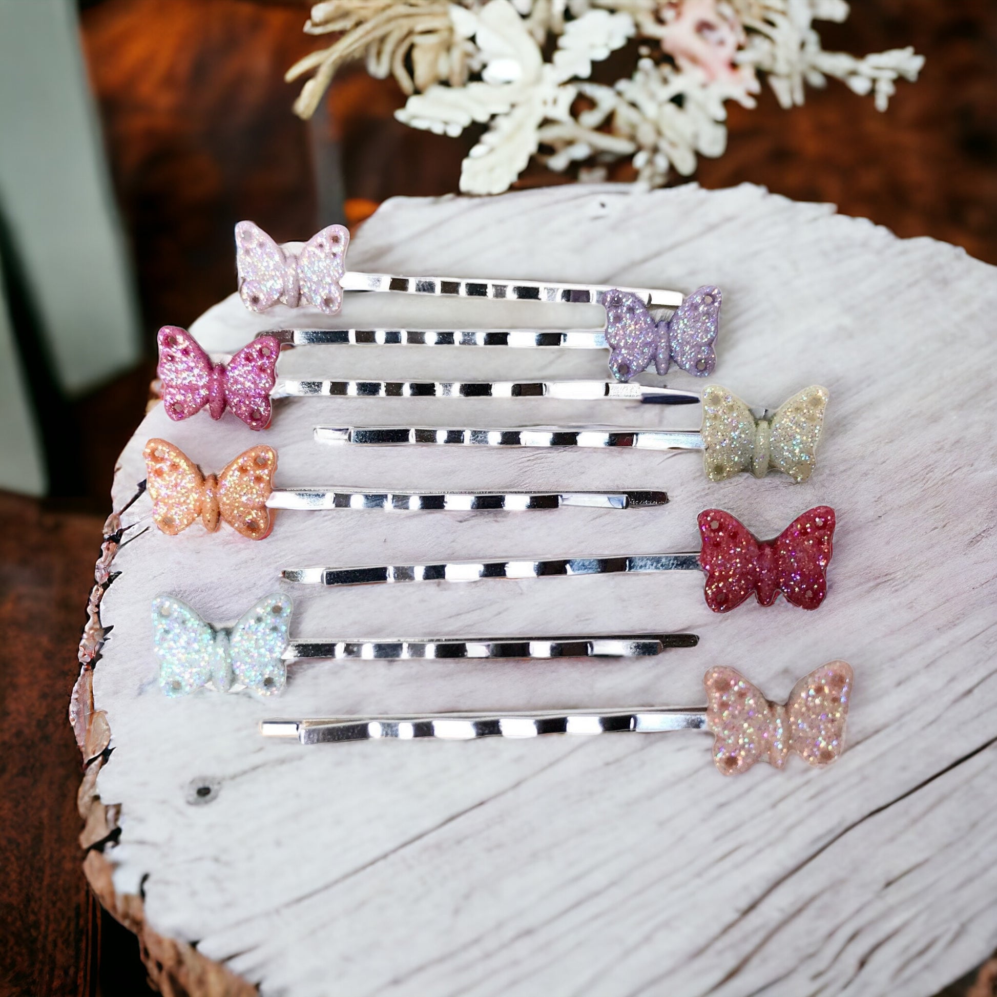 Silver-toned bobby pins with whimsical butterfly details