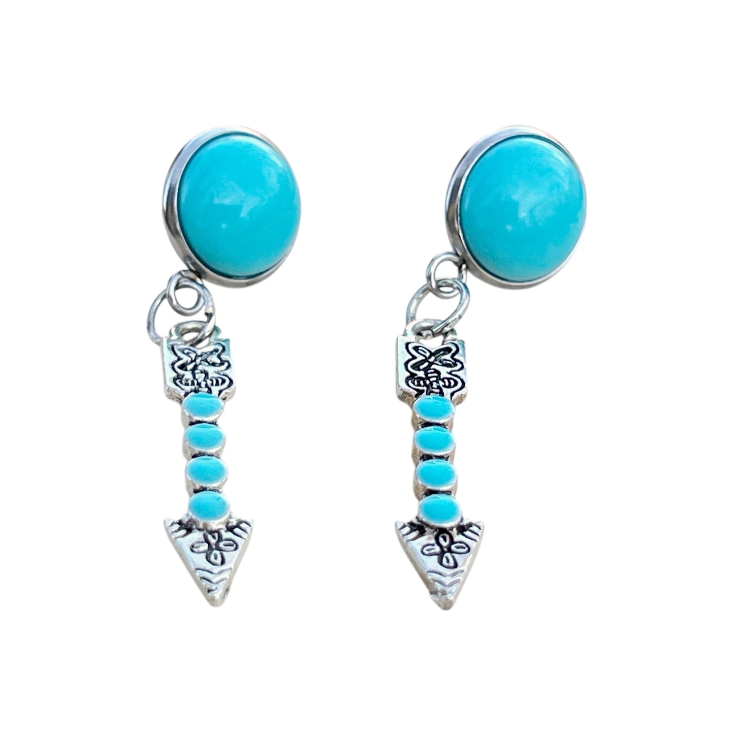 Turquoise Arrow Earrings – Handmade Boho Western Dangles on white background