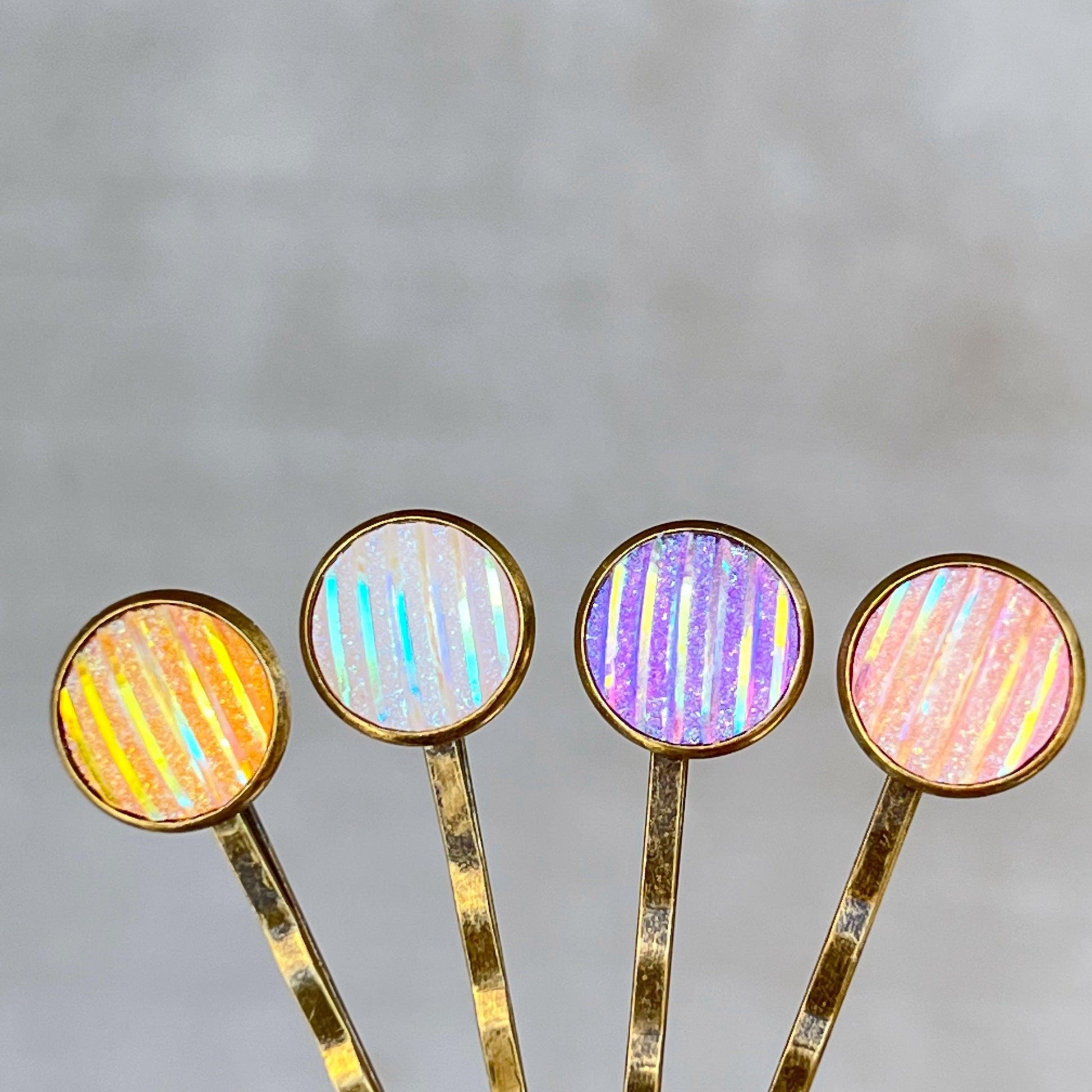 Set of 4 Brass-Toned Hair Pins: Vibrant Accents in Purple, Yellow, Pink, and White Striped Glitter Design