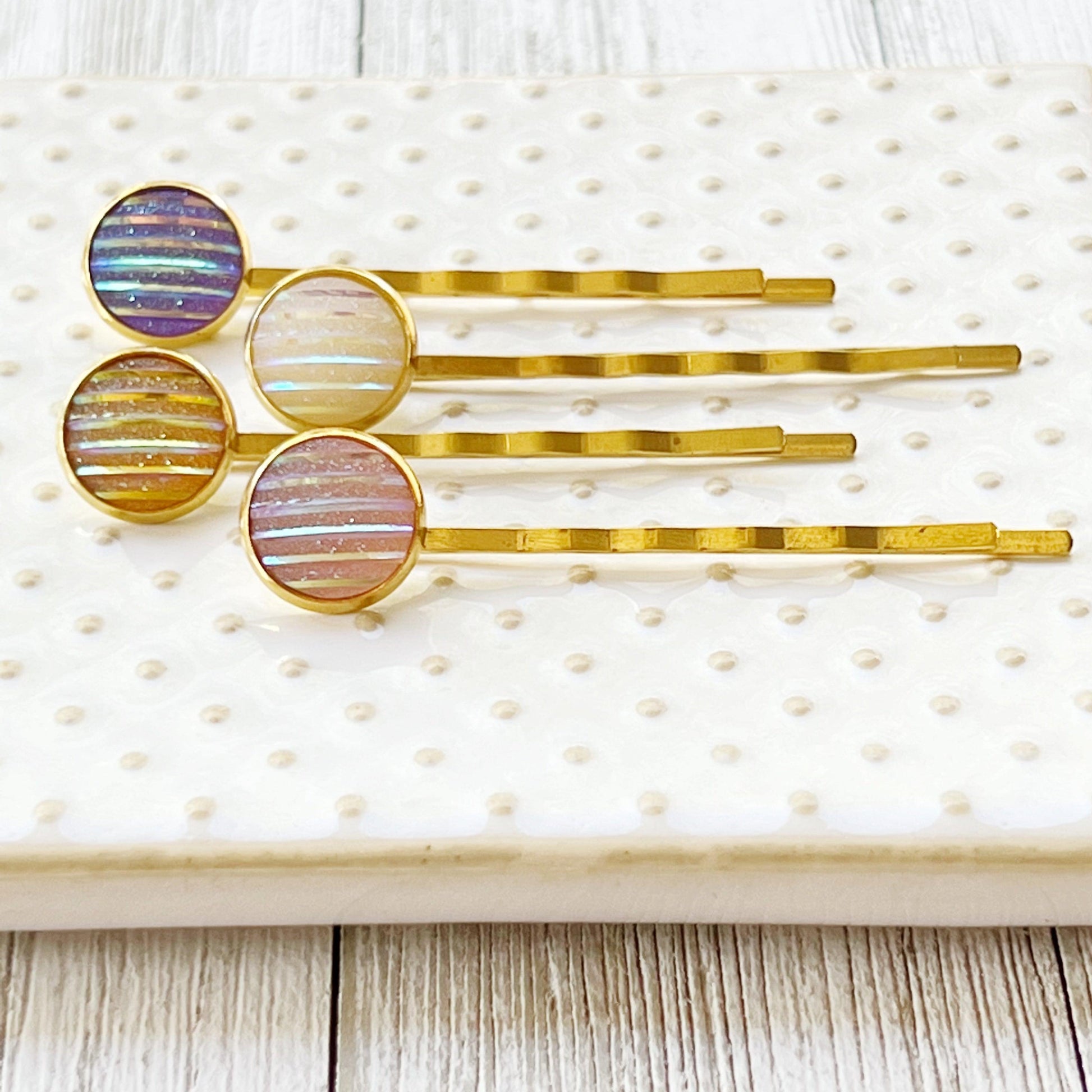 Set of 4 Gold-Toned Hair Pins: Vibrant Accents in Purple, Yellow, Pink, & White Striped Glitter Design