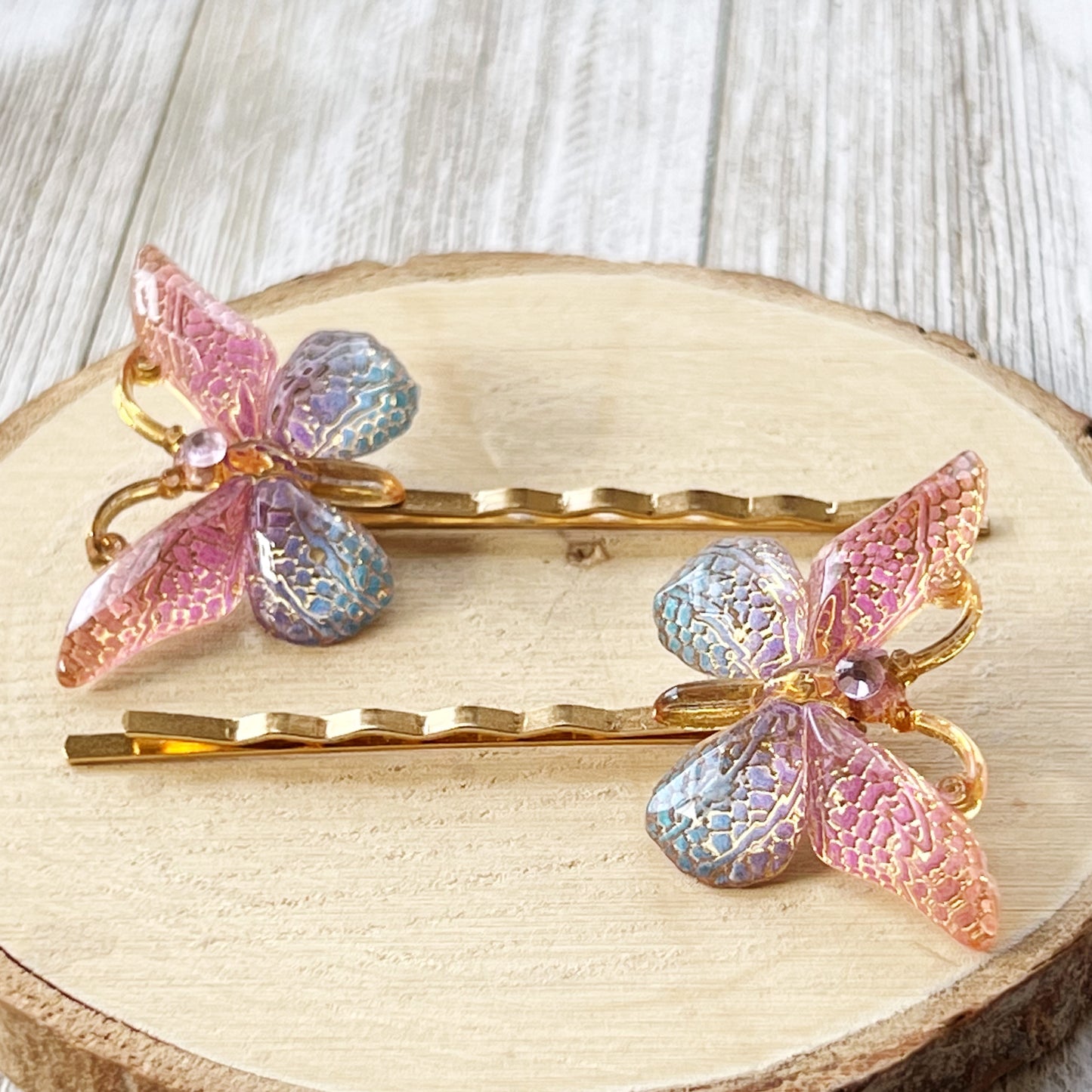 Large Acrylic Butterfly Hair Pins: Vibrant Pink, Blue & Gold tones with Rhinestone Accents for Statement Hairstyles