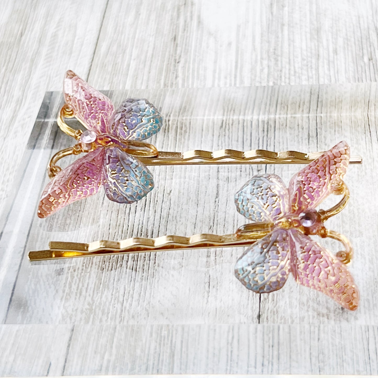 Large Acrylic Butterfly Hair Pins: Vibrant Pink, Blue & Gold tones with Rhinestone Accents for Statement Hairstyles