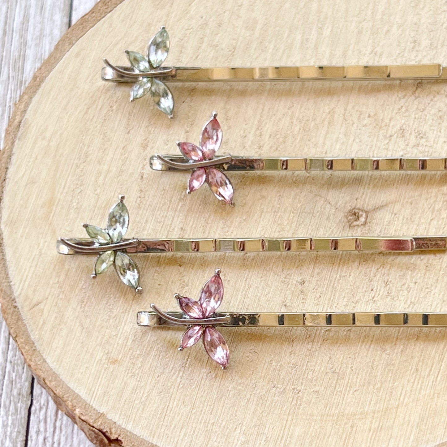 Whimsical pastel dragonfly bobby pins with floral vibe
