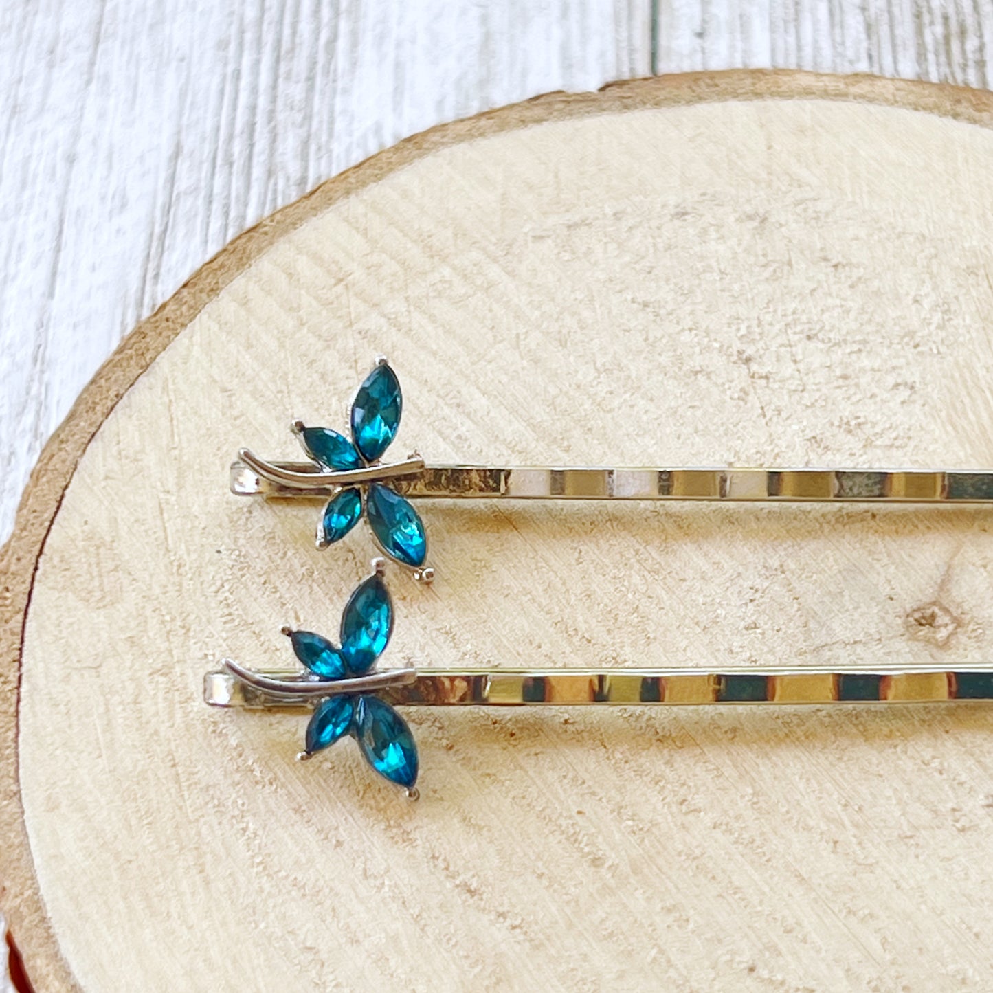 Nature-themed teal rhinestone dragonfly hair pins for women