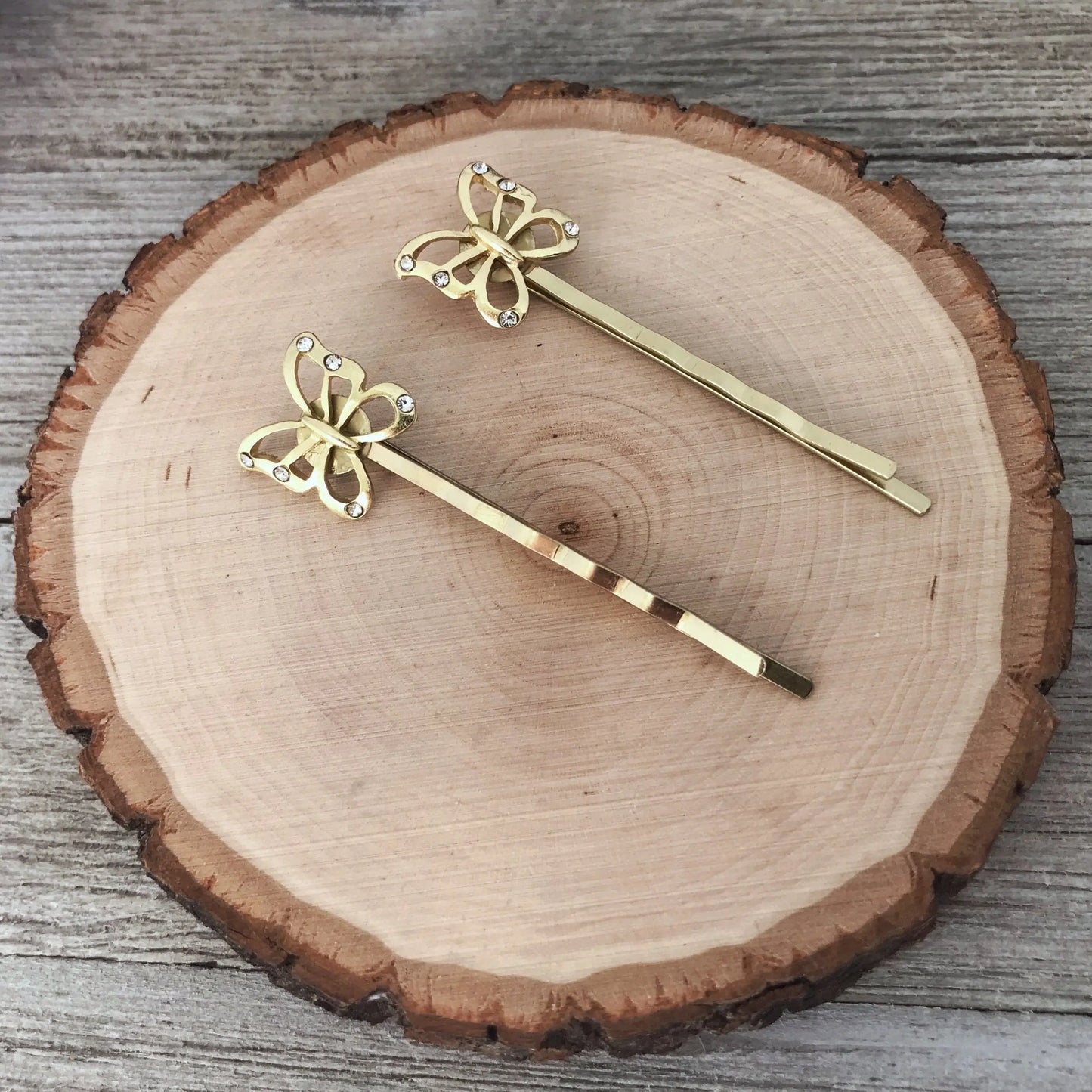 Gold butterfly hair pins styled for spring and everyday wear