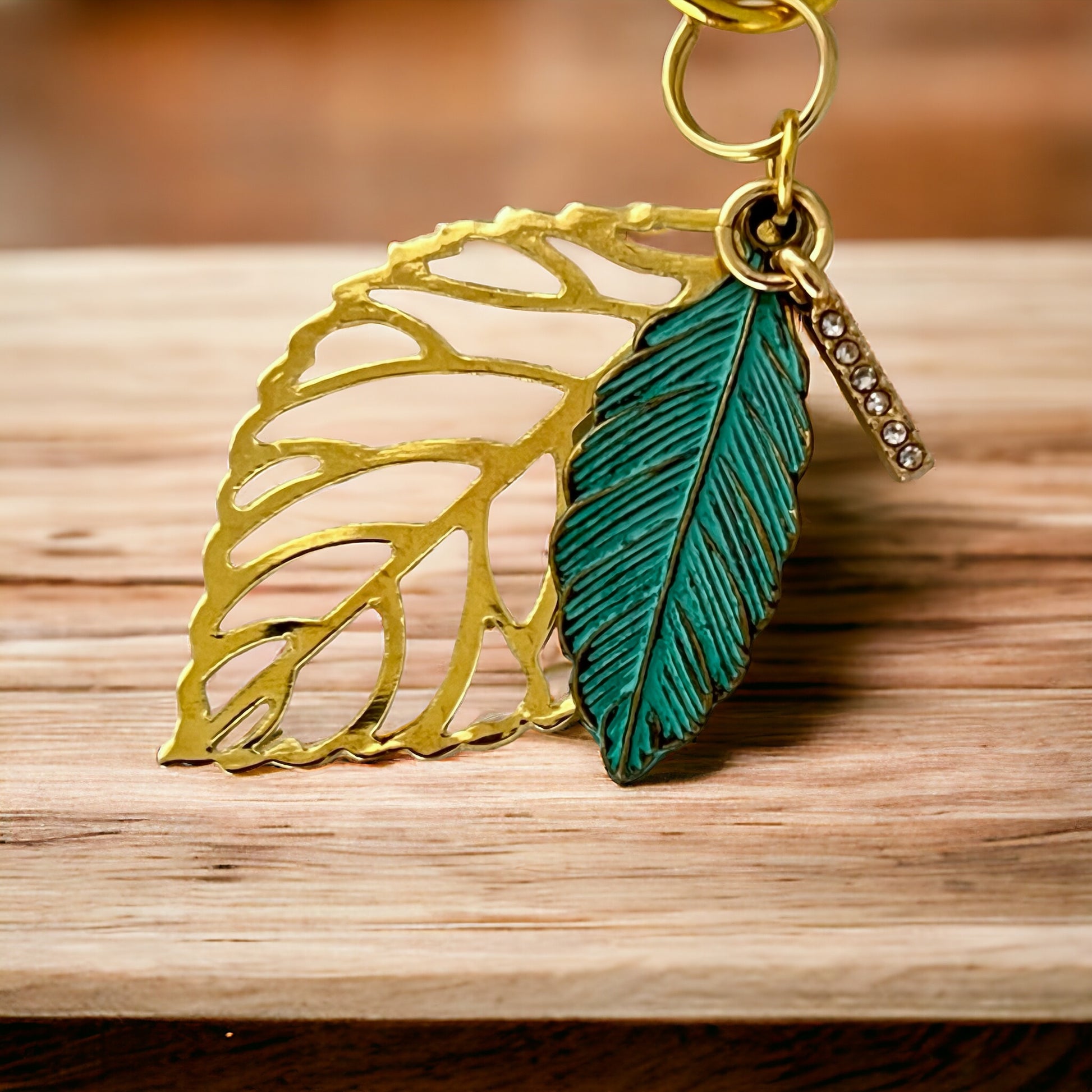 Green Feather & Leaf Purse Charm – Boho Chic Gold Keychain with Rhinestones