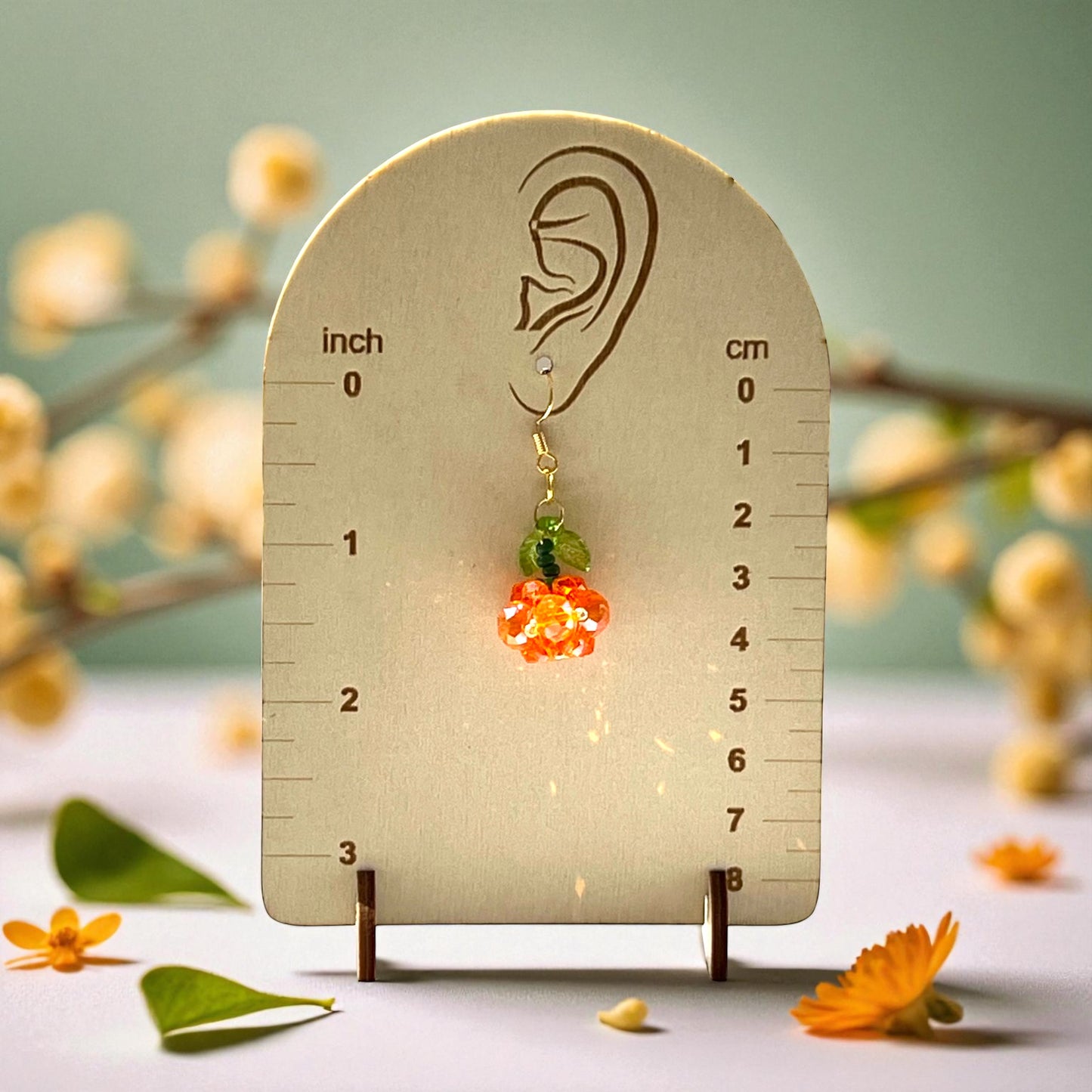 Beaded Pumpkin Earrings – Sparkly Fall Dangles with Green Leaves