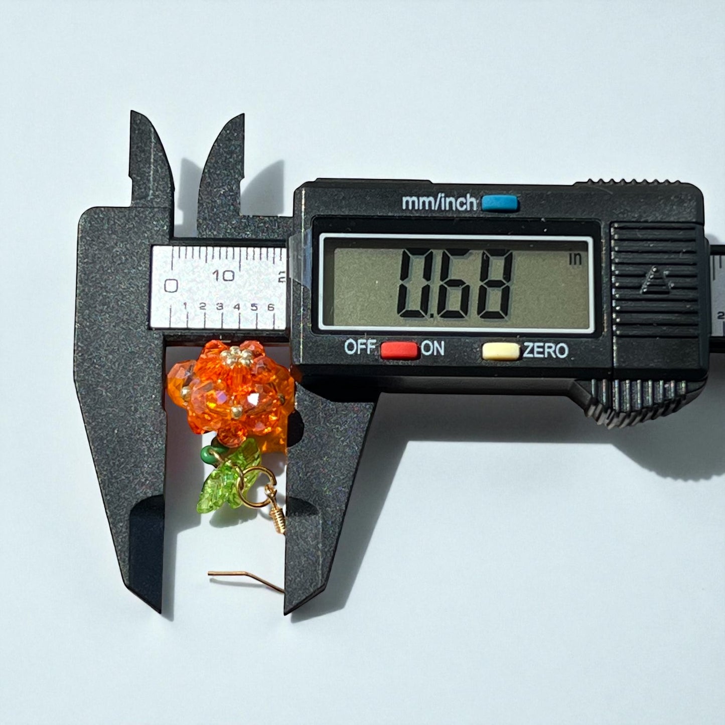 Beaded Pumpkin Earrings – Sparkly Fall Dangles with Green Leaves