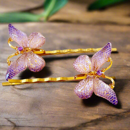 Horquillas de pelo de mariposa moradas y doradas