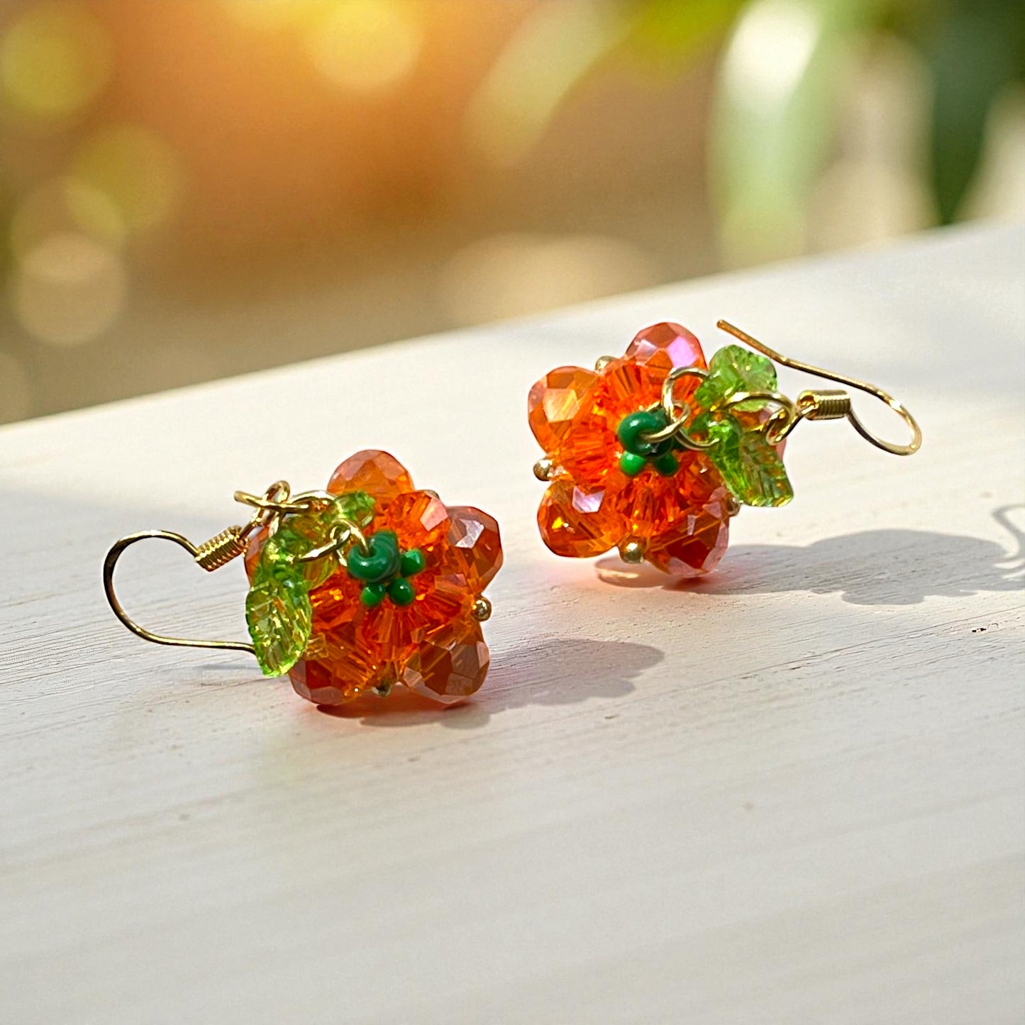 Beaded Pumpkin Earrings – Sparkly Fall Dangles with Green Leaves