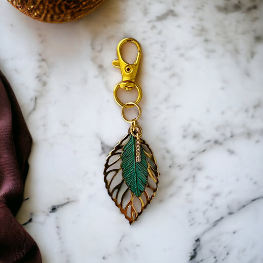 Green Feather & Leaf Purse Charm – Boho Chic Gold Keychain with Rhinestones