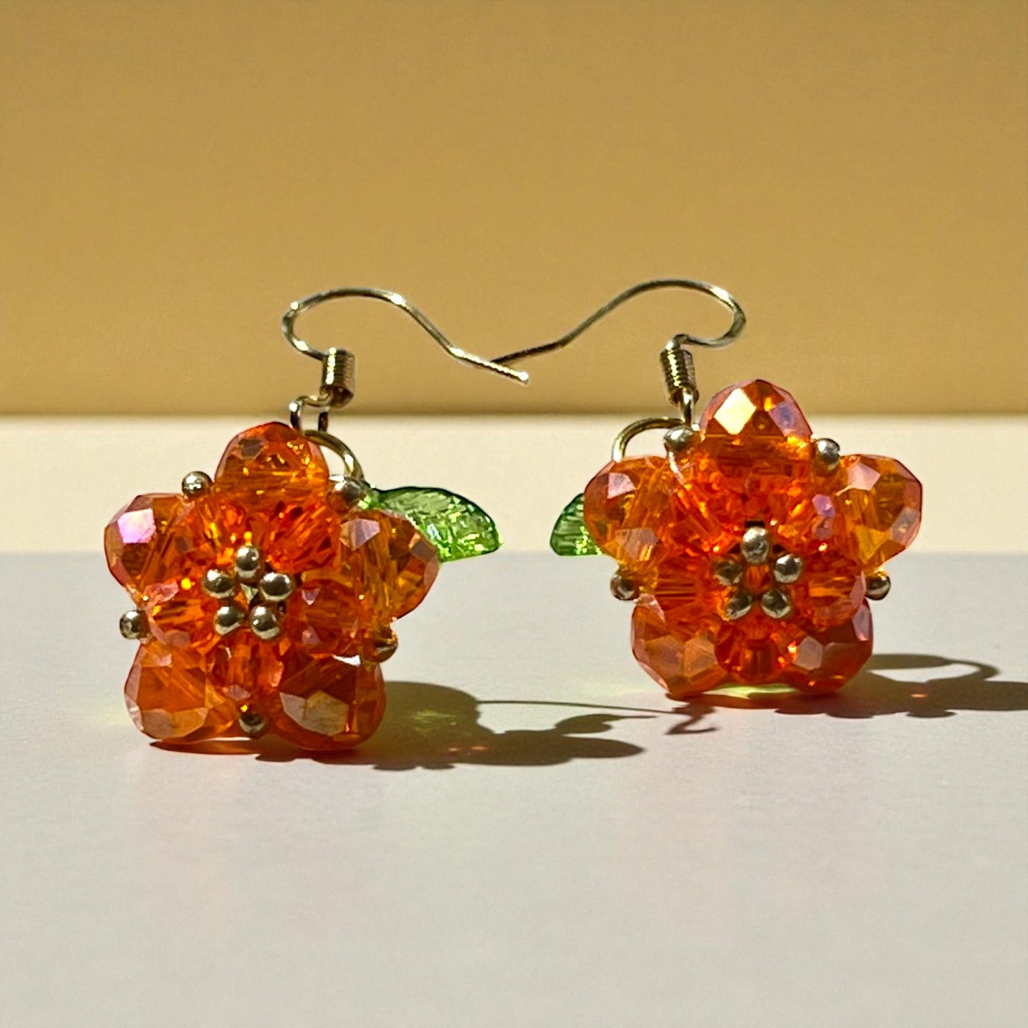 Beaded Pumpkin Earrings – Sparkly Fall Dangles with Green Leaves