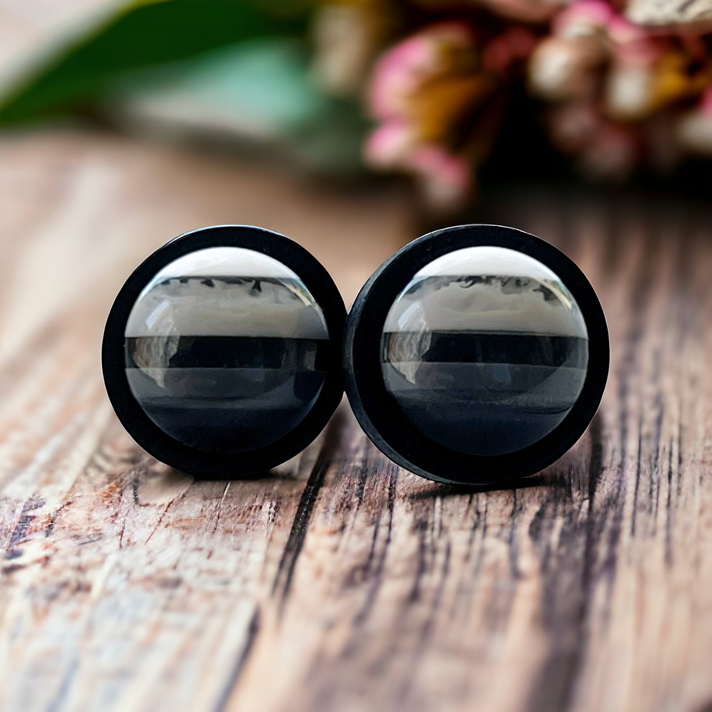 Stripe Stud Earrings on wood with flowers