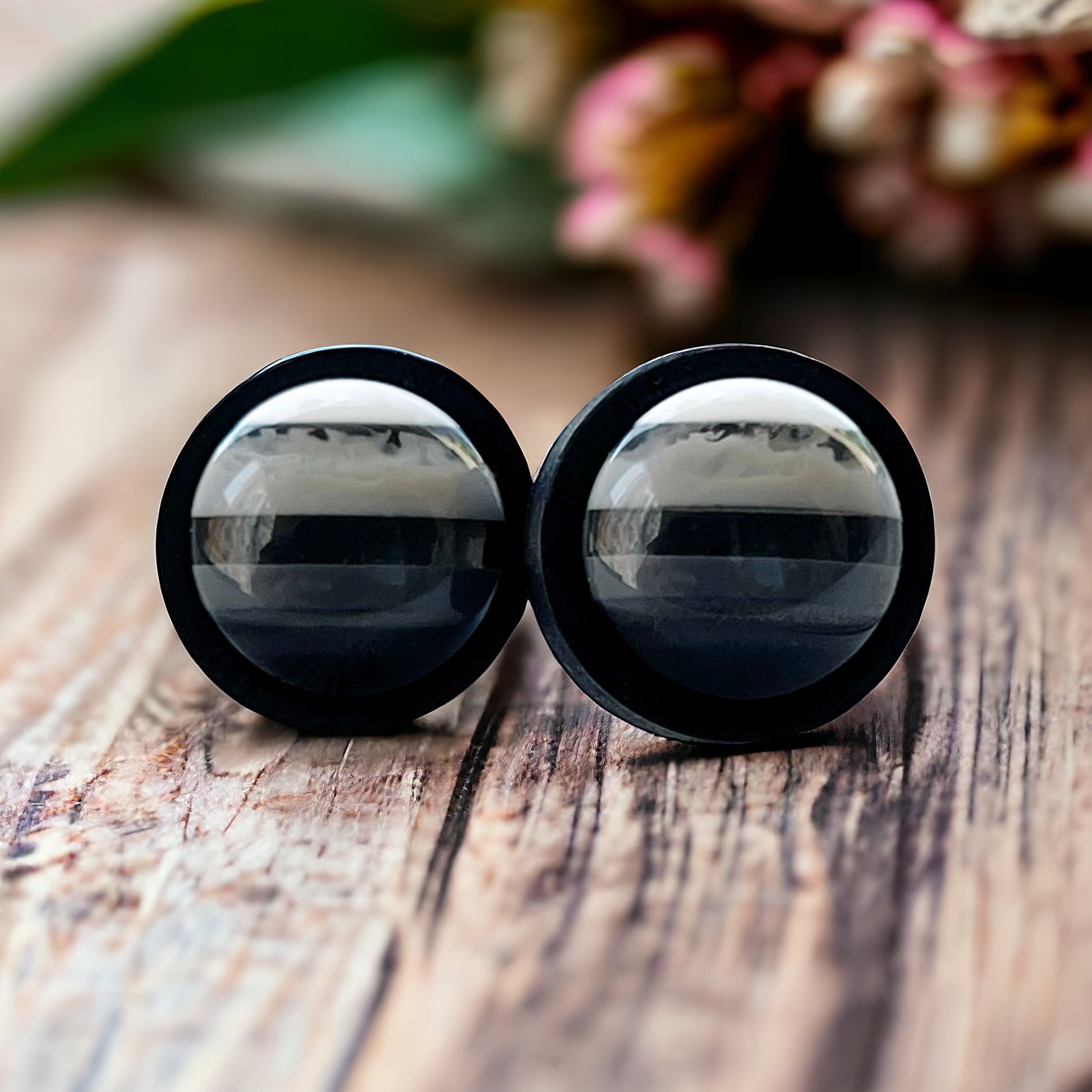 Stripe Stud Earrings on wood with flowers