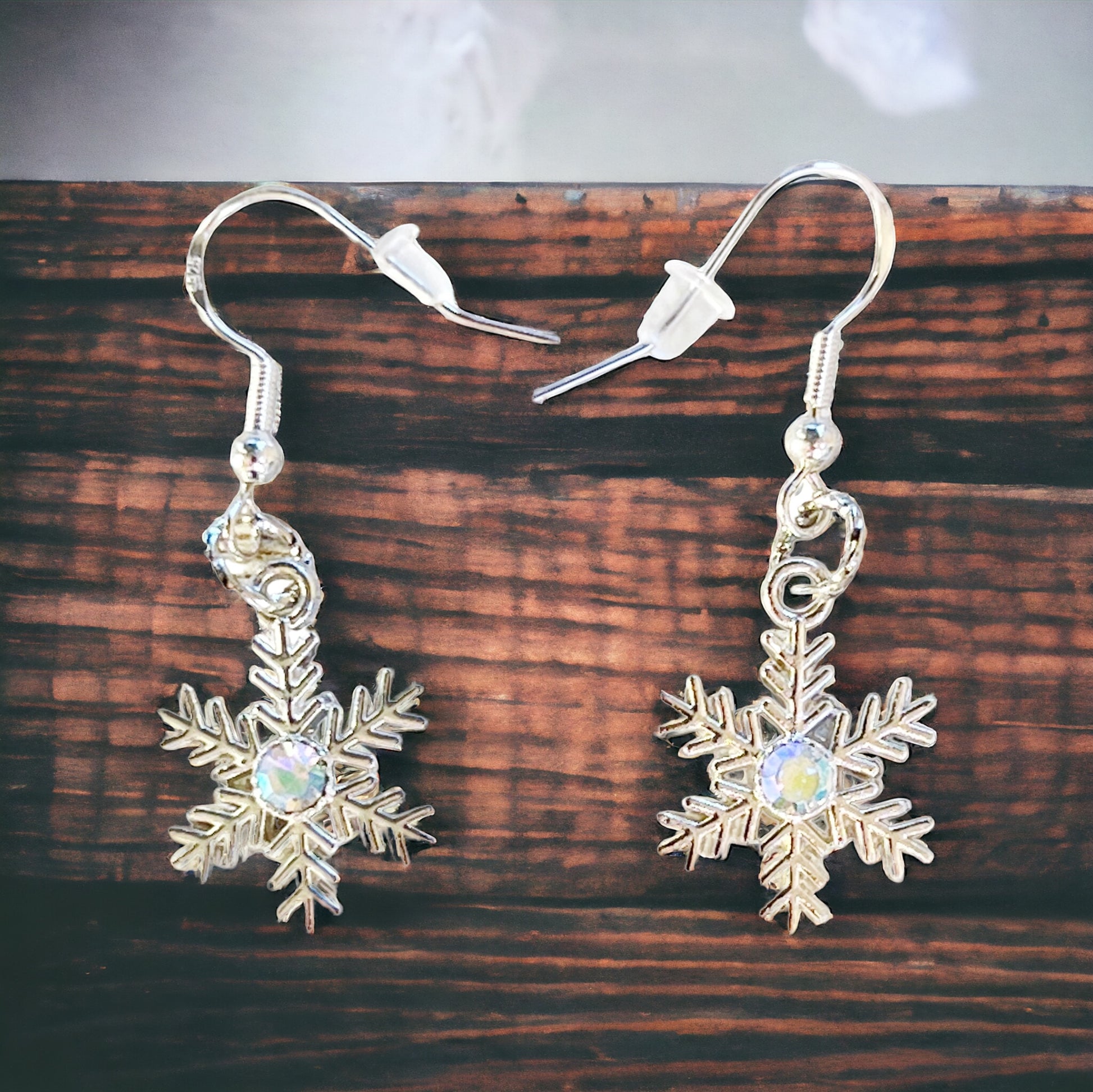 Silver Snowflake Dangle Earrings: Sparkling Rhinestone Accents for Winter Charm