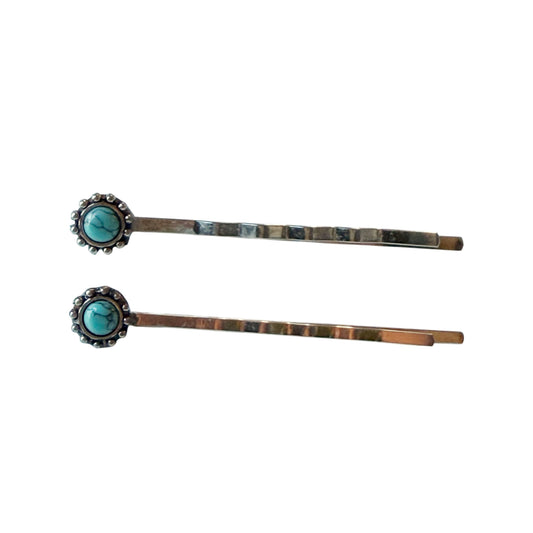 Exactly two genuine silver-tone faux-turquoise western hair pins on clean white background, isolated from the original F31 photograph