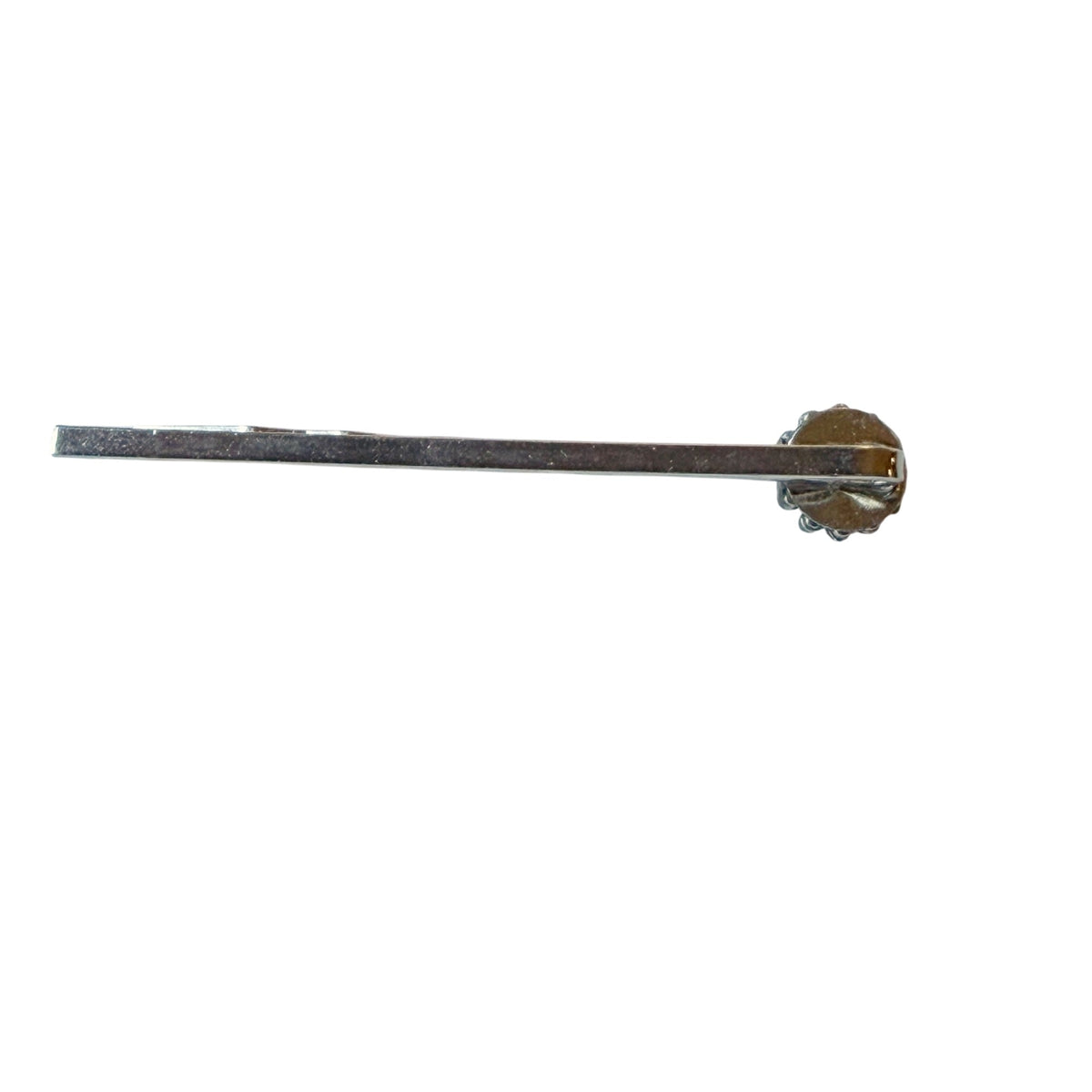 Side profile of one of the four silver-tone faux-turquoise western hair pins included in matching earrings gift set
