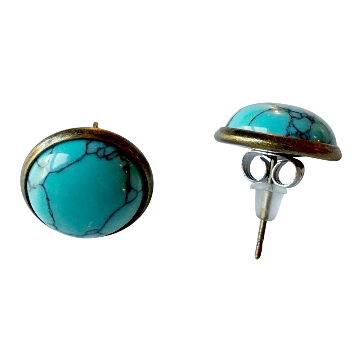 Real front and back of antique brass-tone turquoise stud earrings with posts and backs