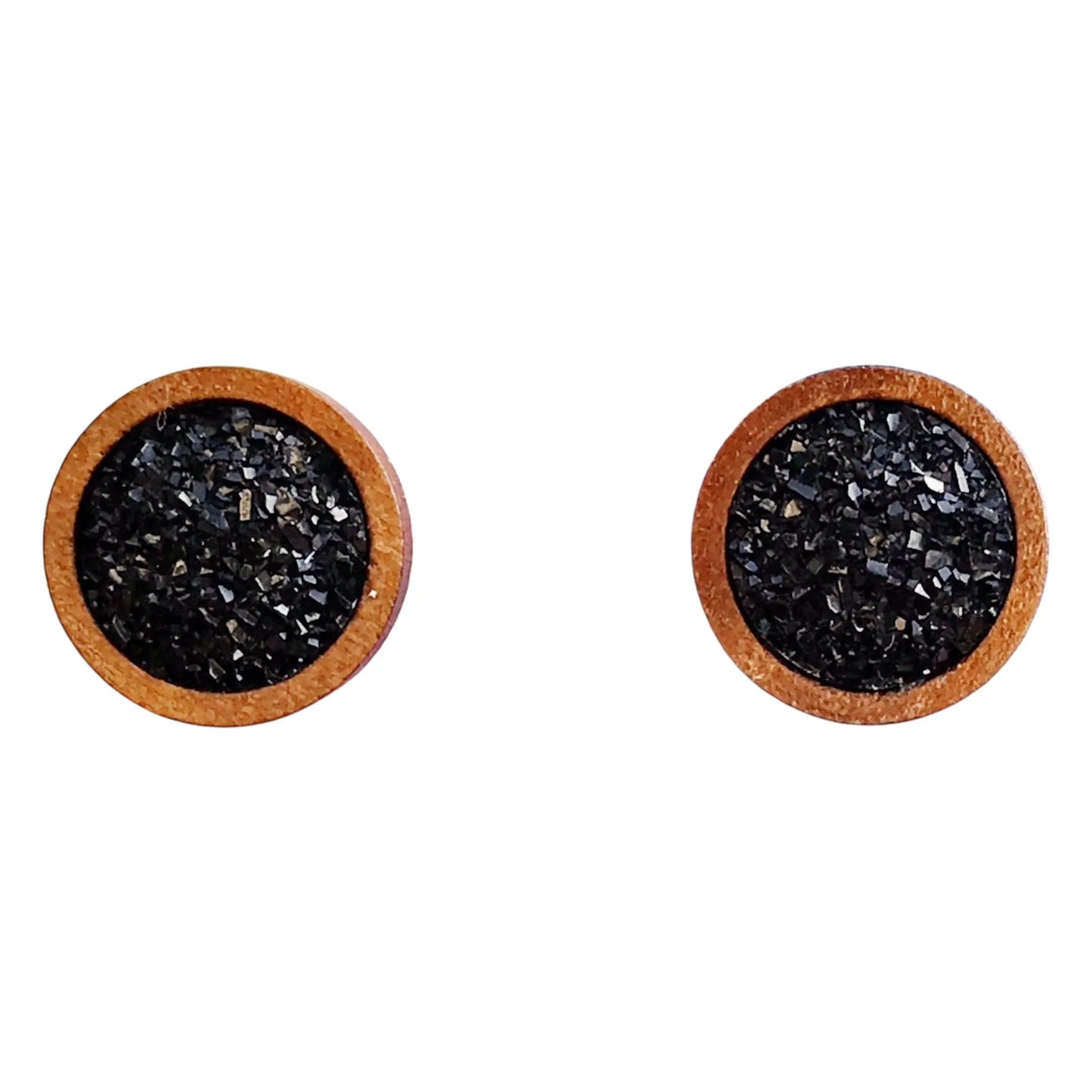 Round black druzy wood stud earrings on a white background 