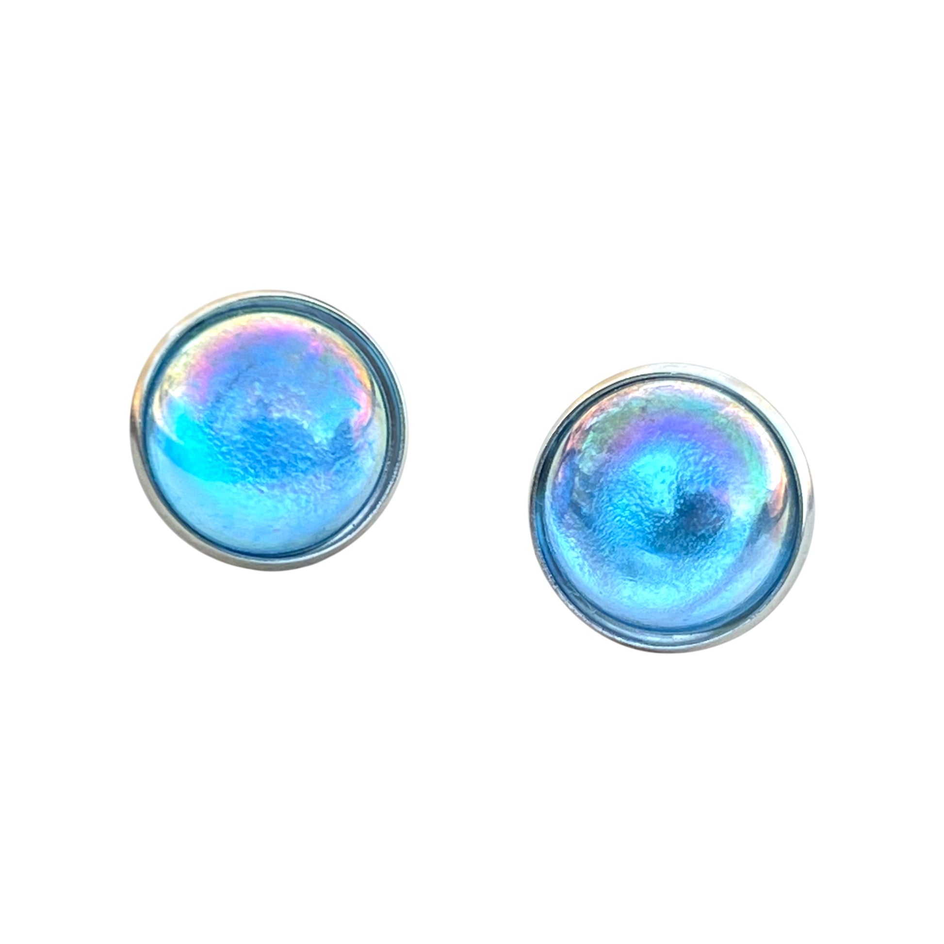 Blue iridescent stud earrings on white background