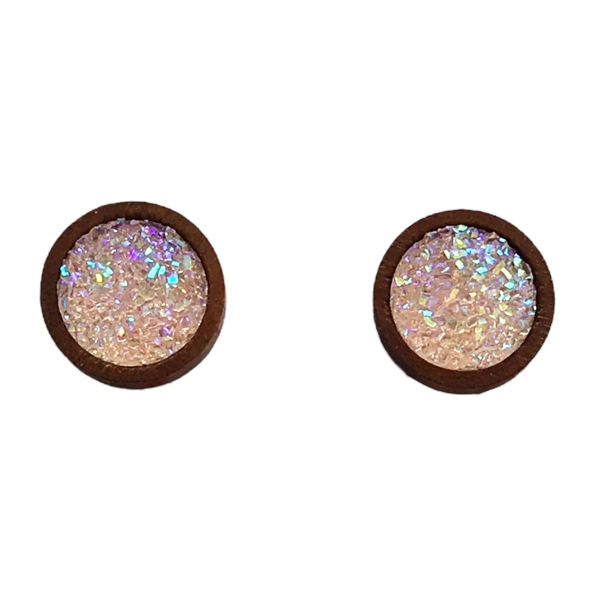 Round blush pink glitter druzy wood stud earrings displayed on a white background 