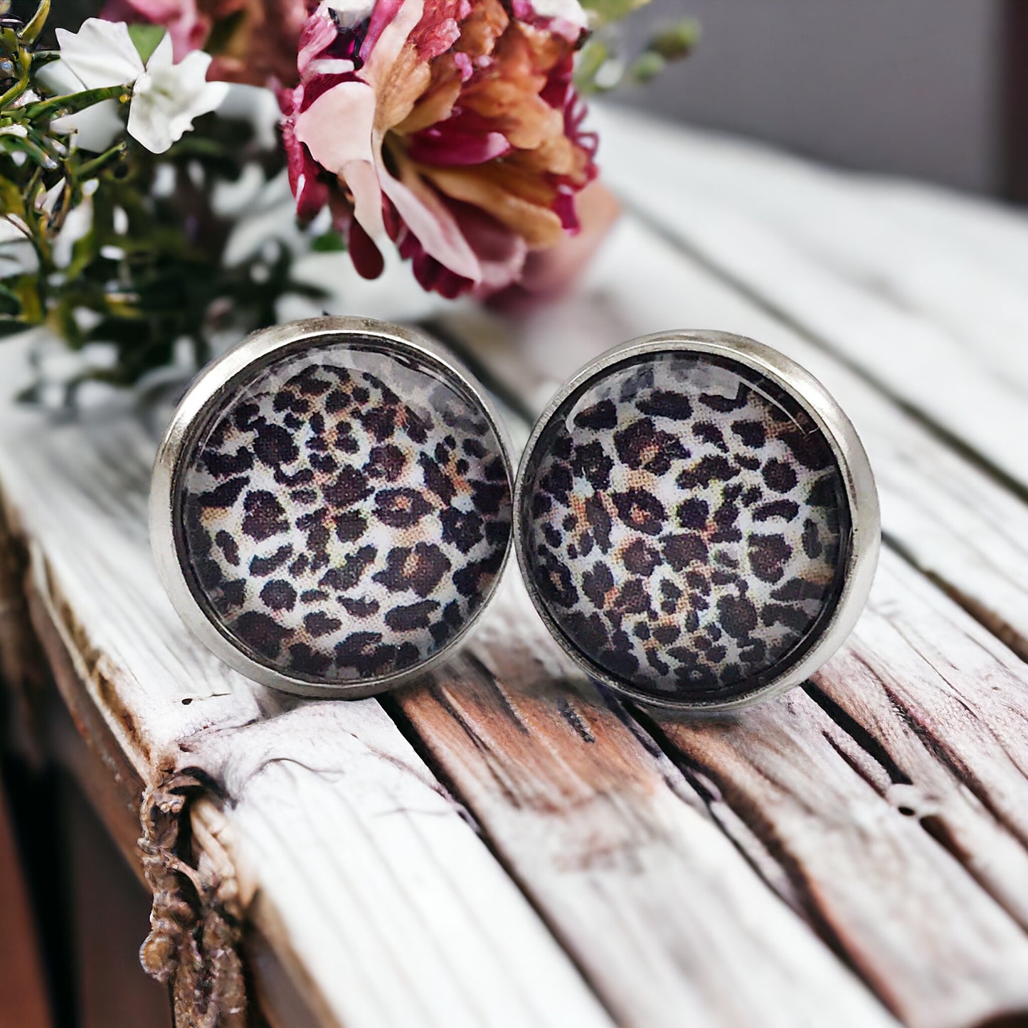 Bold animal print earrings shown from multiple angles