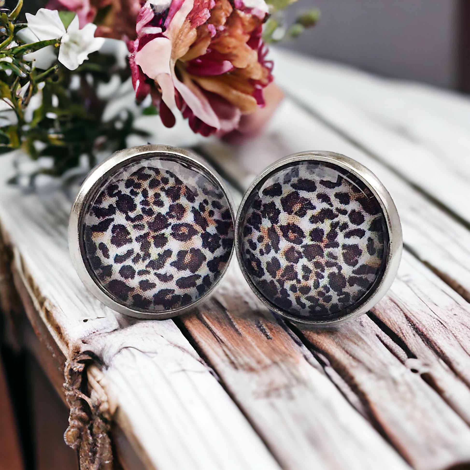 Bold animal print earrings shown from multiple angles