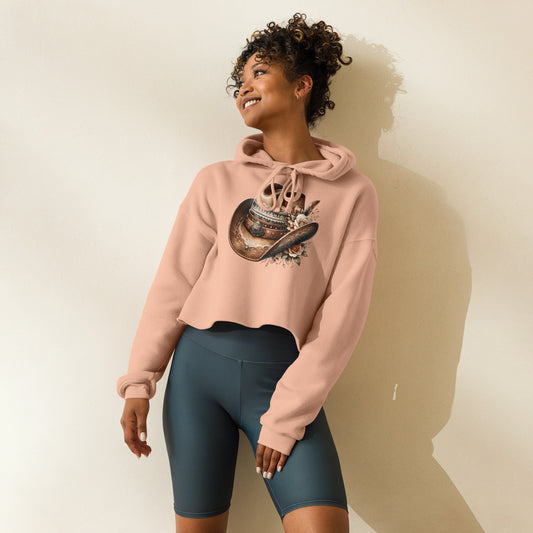 Model in peach western crop hoodie with floral cowgirl hat design