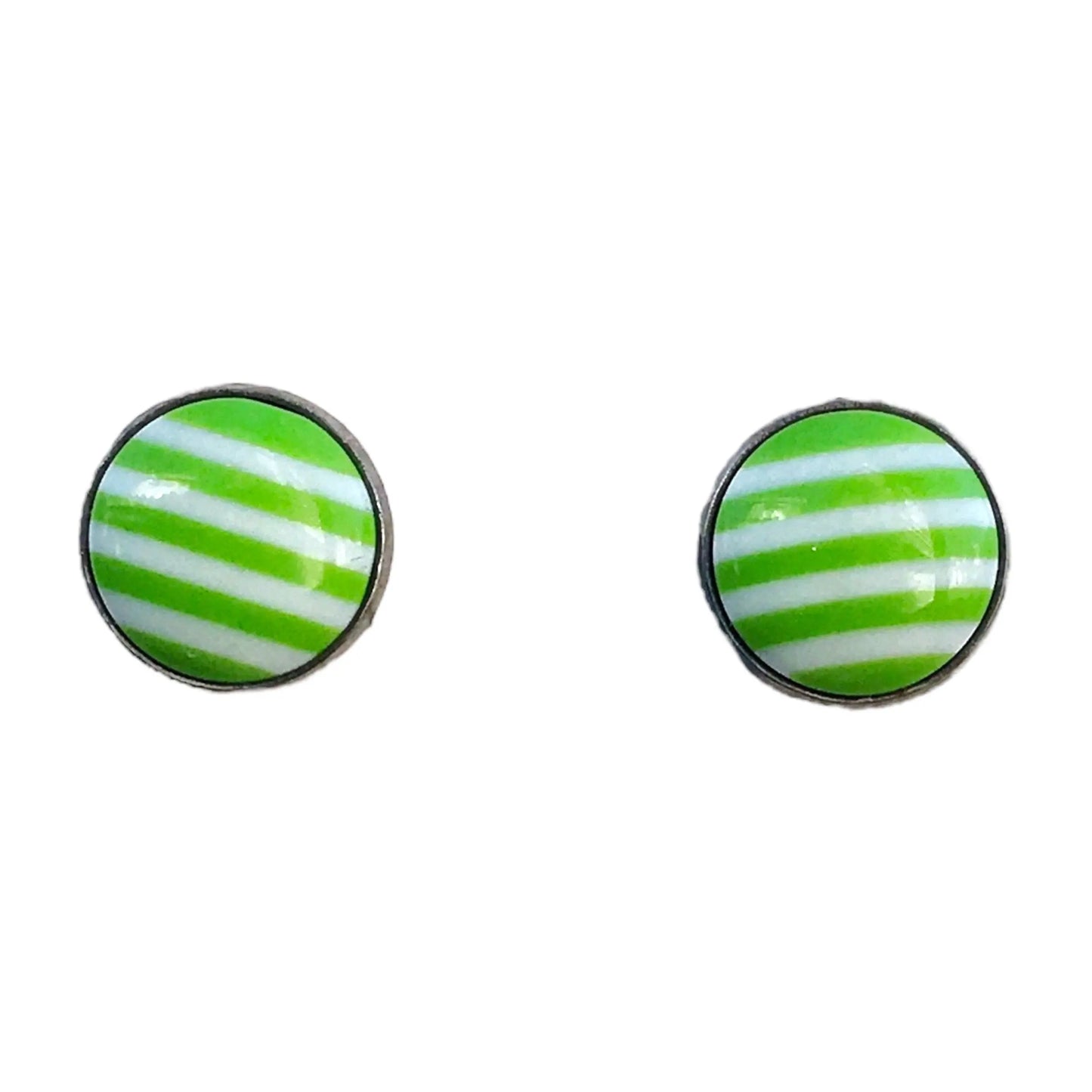Pair of round green and white striped earrings on a white background