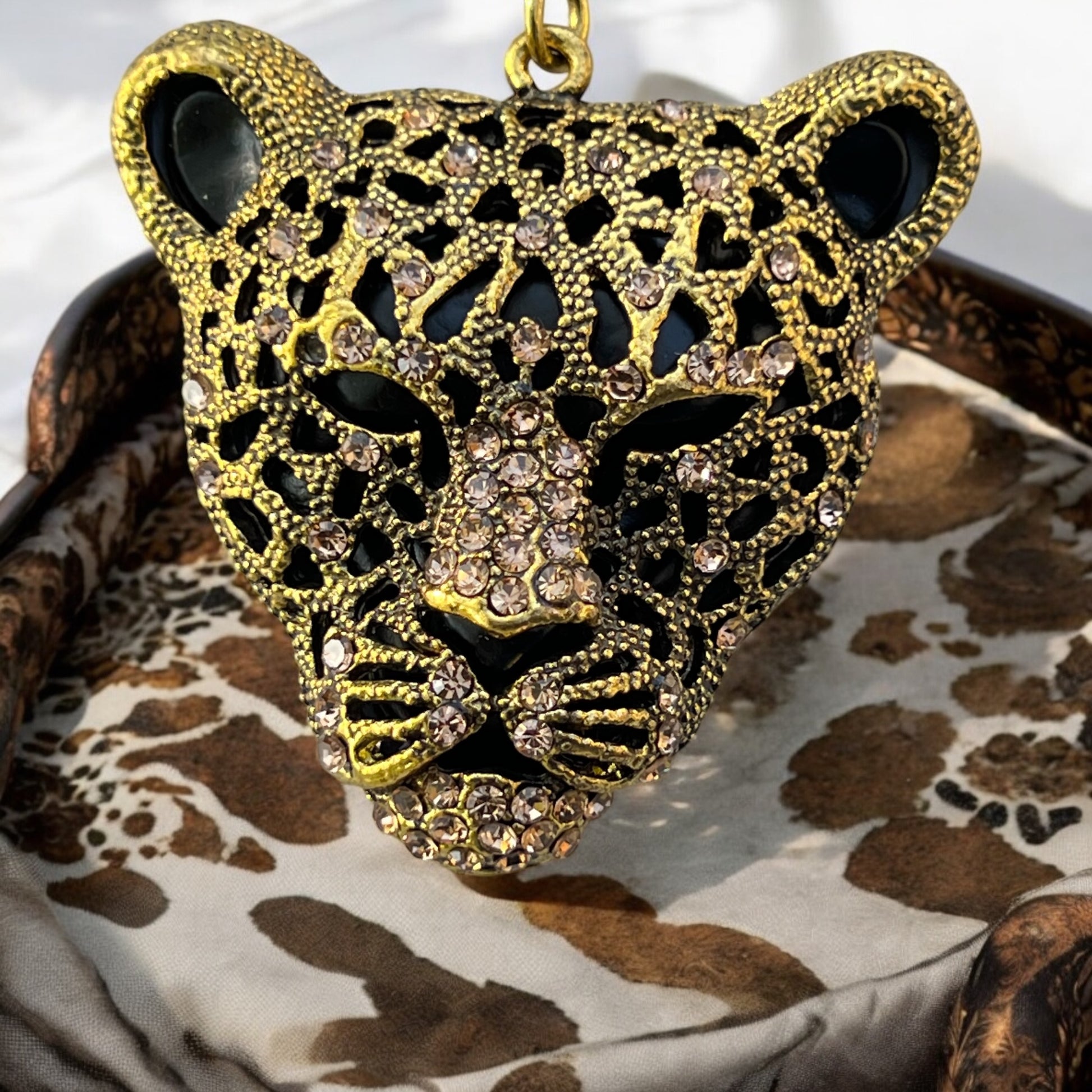 Handmade cheetah purse charm styled with fashion accessories