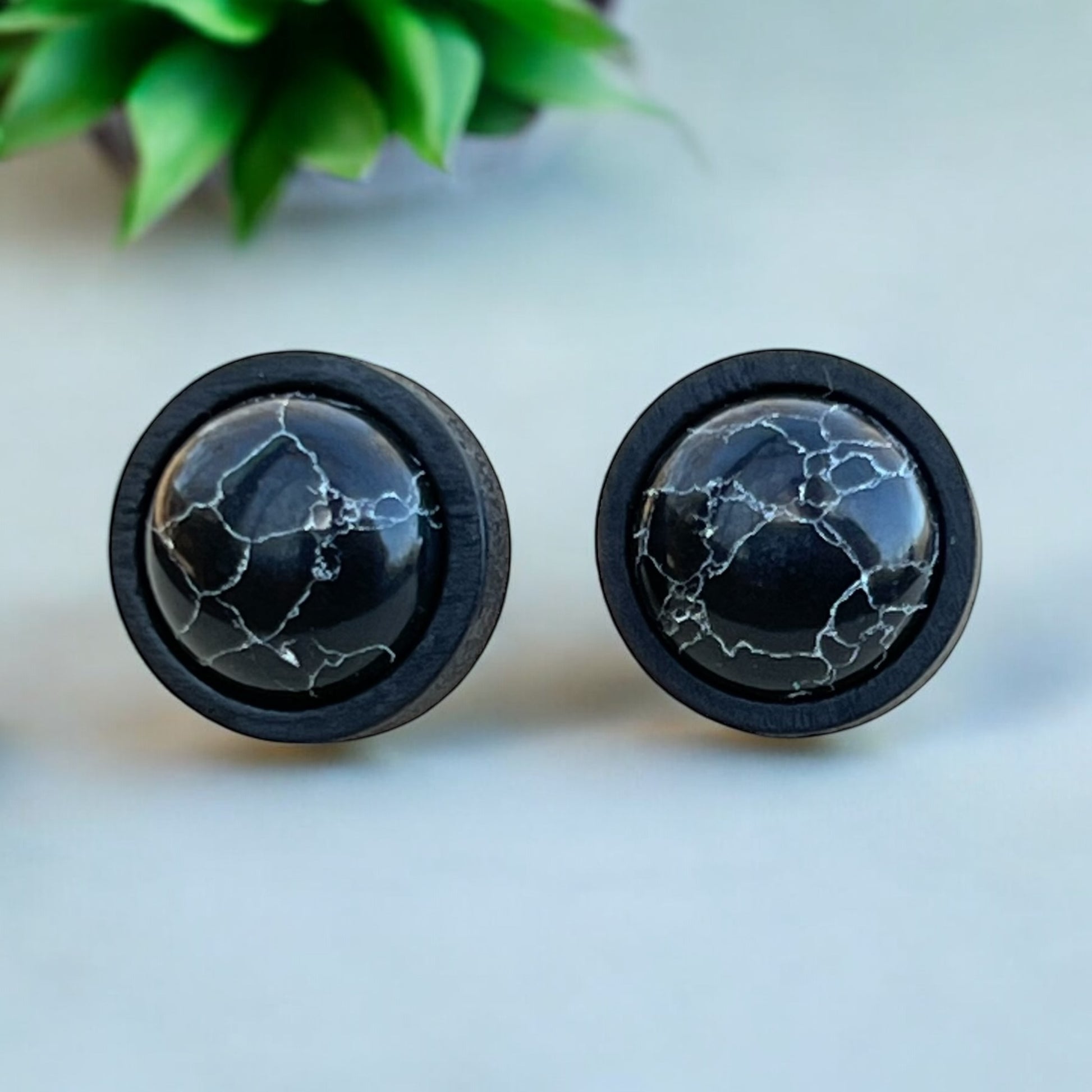 Black minimalist earrings with marble pattern and silver posts