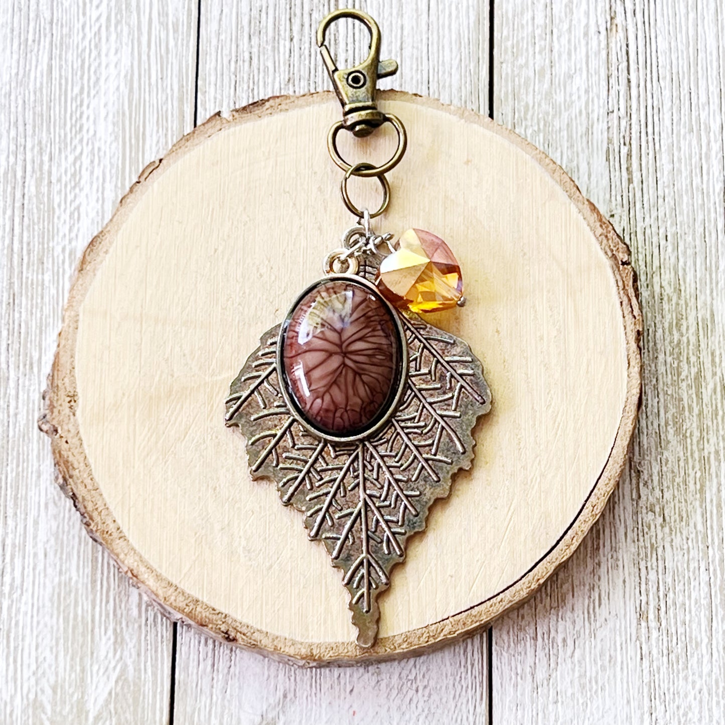 Leaf Purse Charm – Bronze Botanical Keychain with Glass Heart Accent