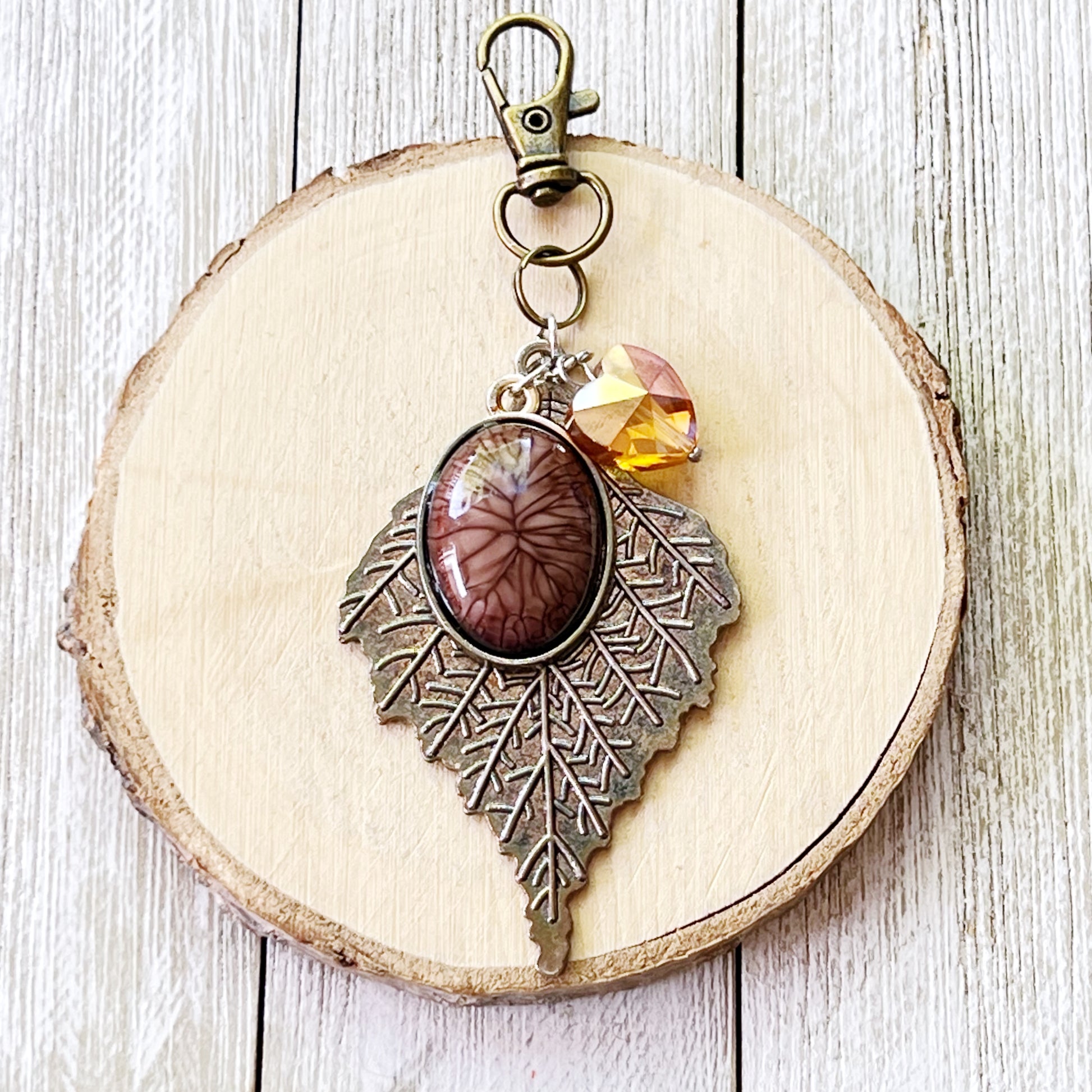Leaf Purse Charm – Bronze Botanical Keychain with Glass Heart Accent