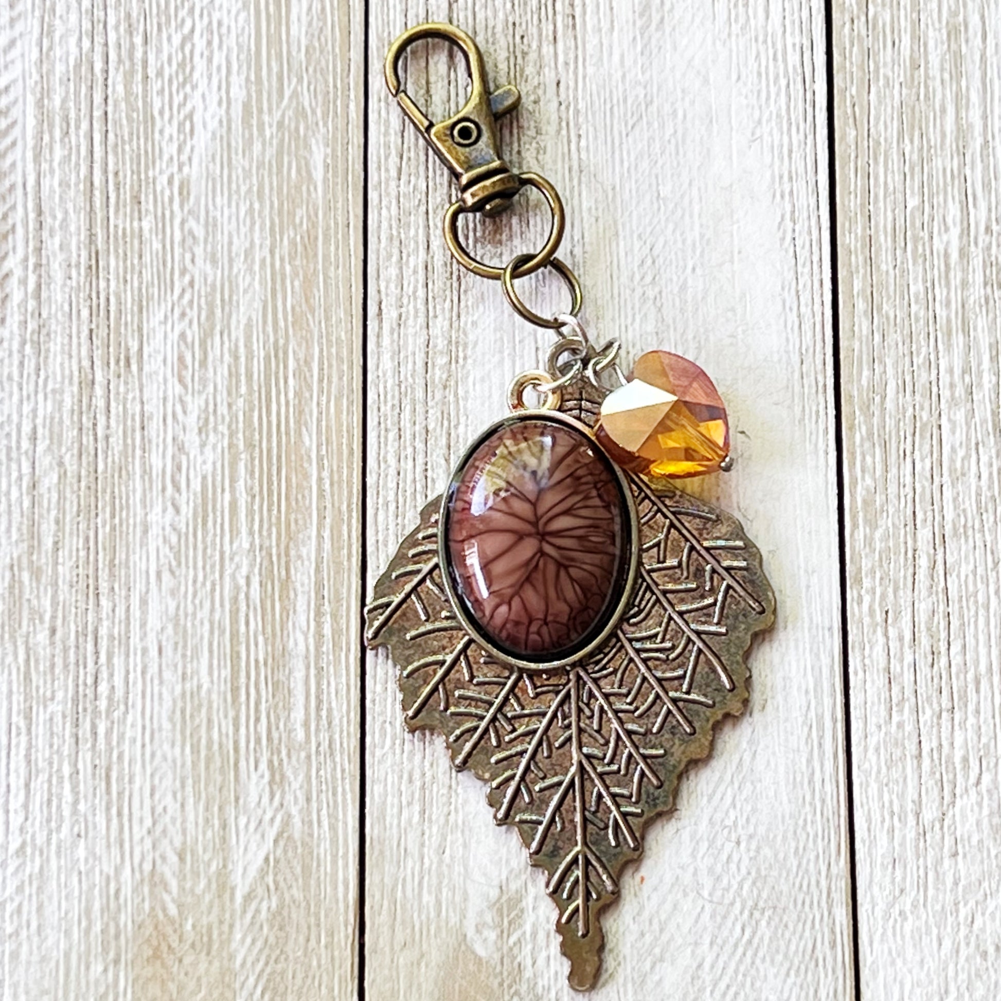 Leaf Purse Charm – Bronze Botanical Keychain with Glass Heart Accent